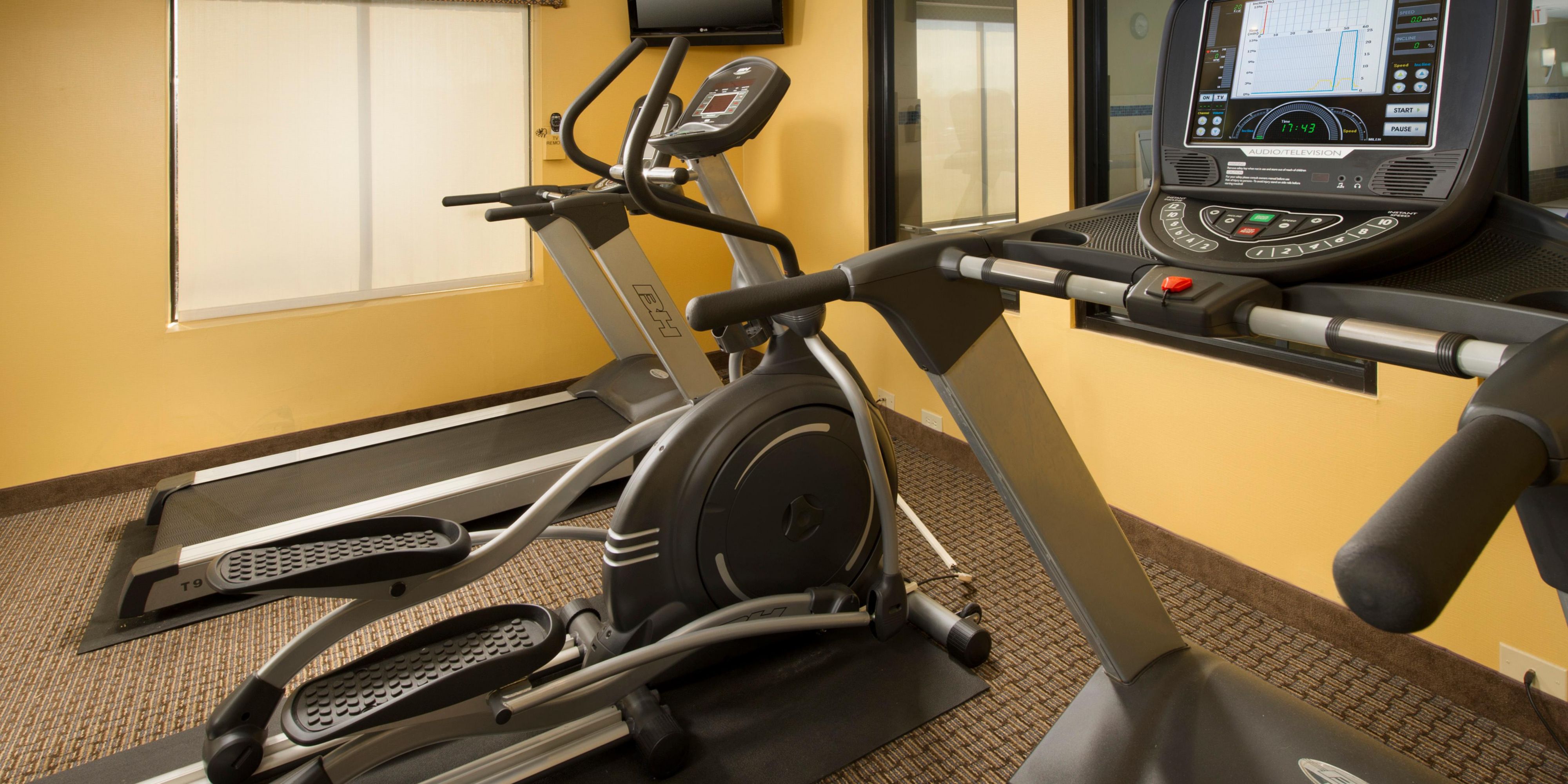 Our fitness center is equipped with an elliptical and a treadmill, both with personal TV's, and a multi-function weight machine, all overlooking our swimming pool area.
