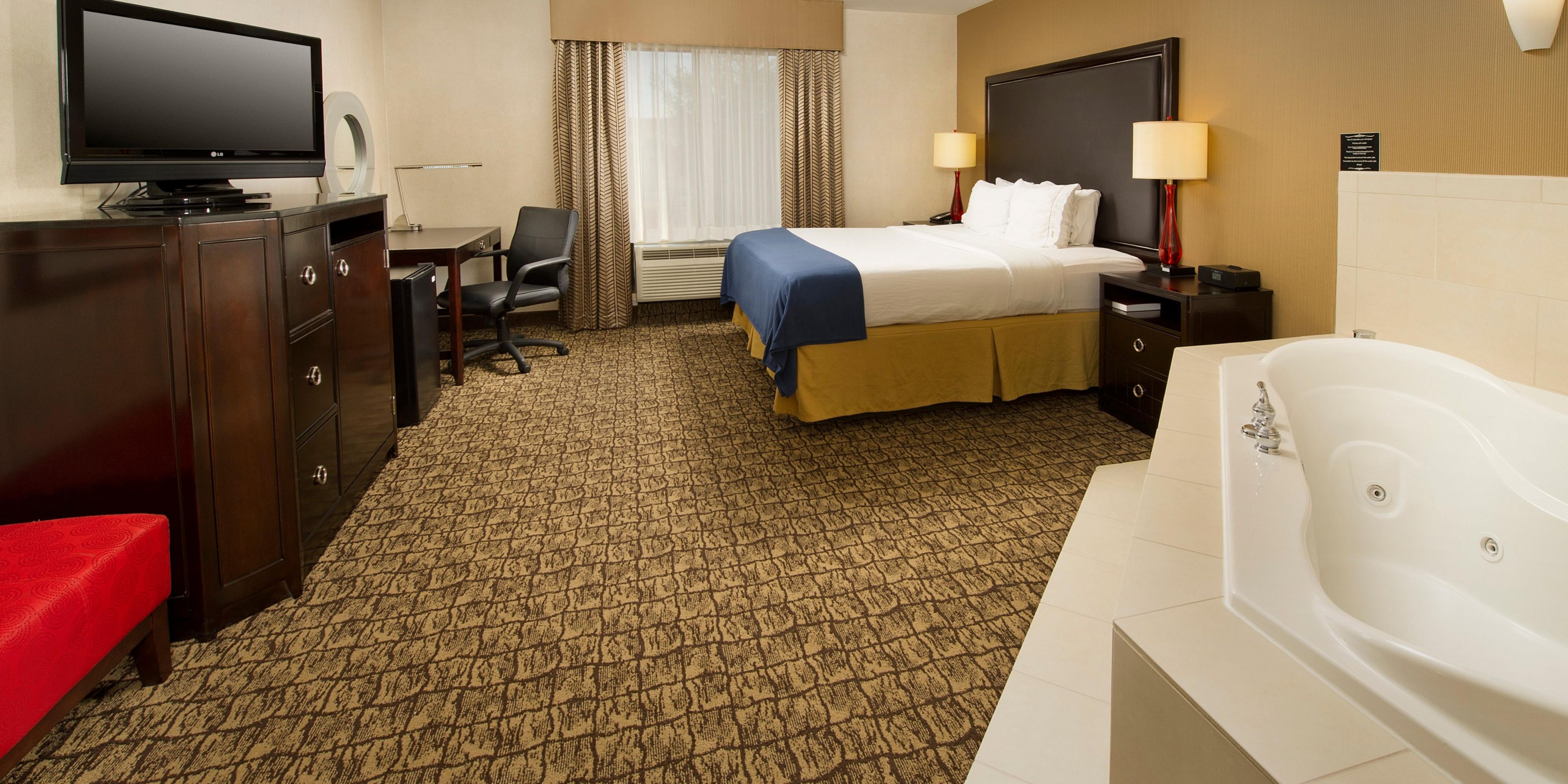 Come enjoy our King Whirlpool Suite, equipped with one king bed, a jetted tub, complimentary  Wi-Fi access, 55" LCD TV, work desk with an ergonomic chair, mini-fridge, coffee pot, hair dryer, iron and ironing board.