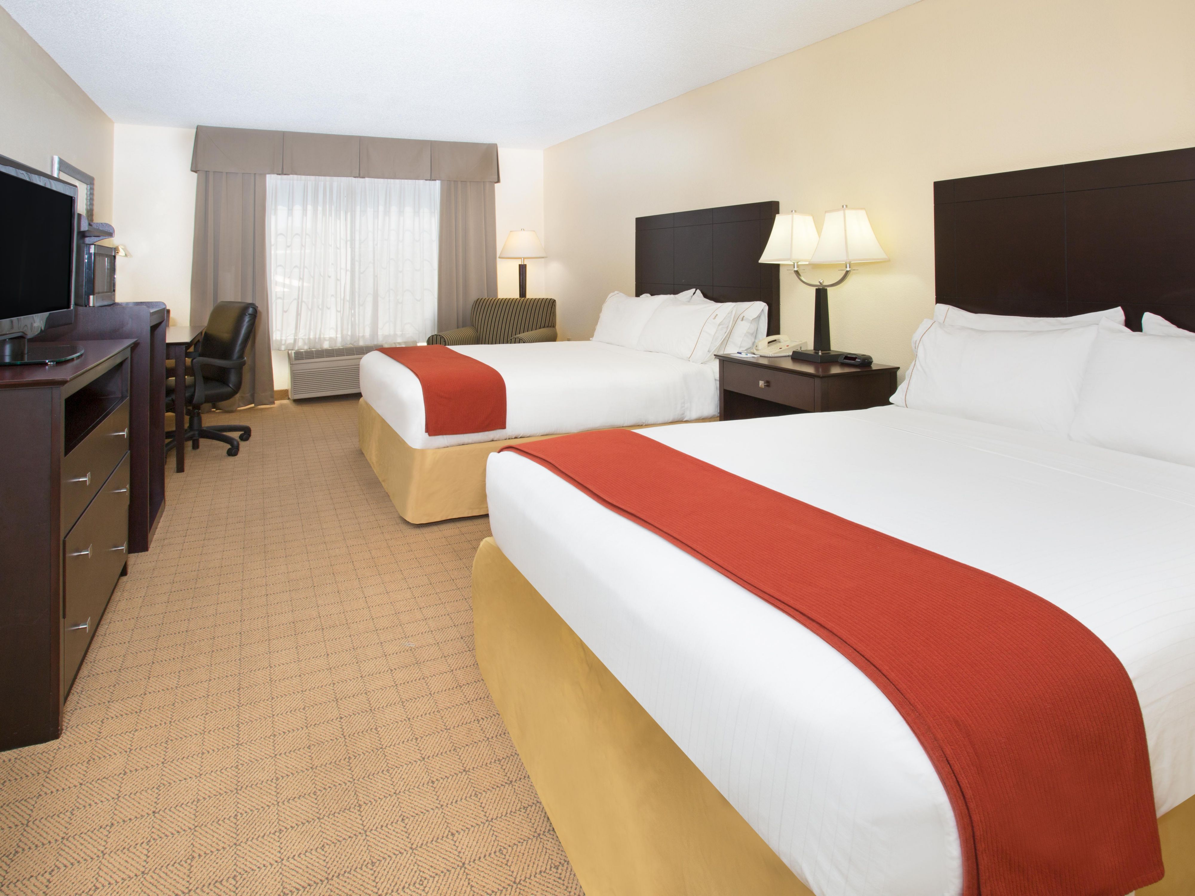 Keep moving in our Deluxe Suite featuring a stationary bike.