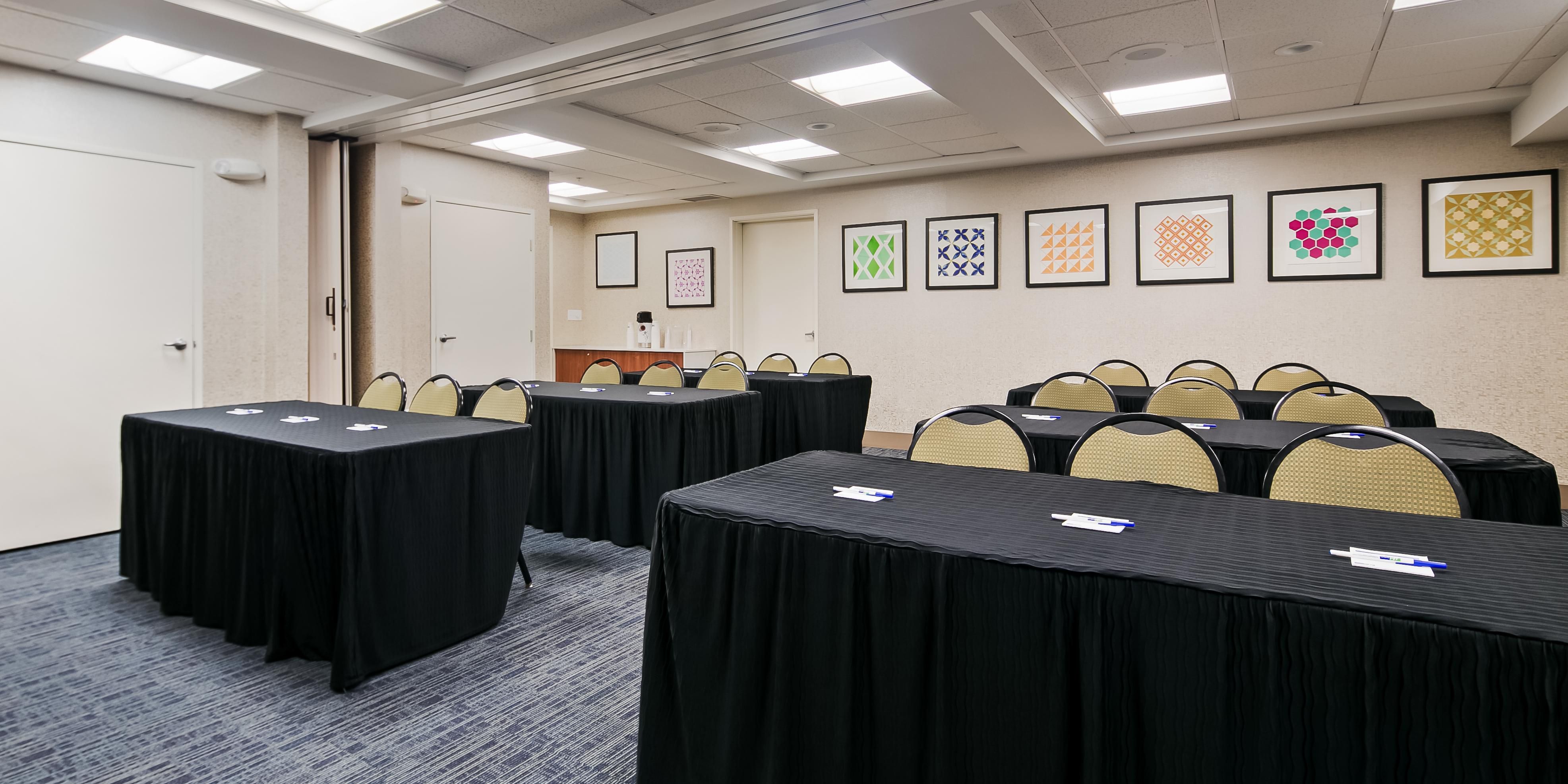 We offer 550 sq ft of flexible meeting space.  We can accommodate up to 40 people Theater Seating and 24 people Classroom Seating. Please call to check space and the number of people we can accommodate.  Our meeting room features a SMART TV that connects to your laptop for presentations and ZOOM calls.