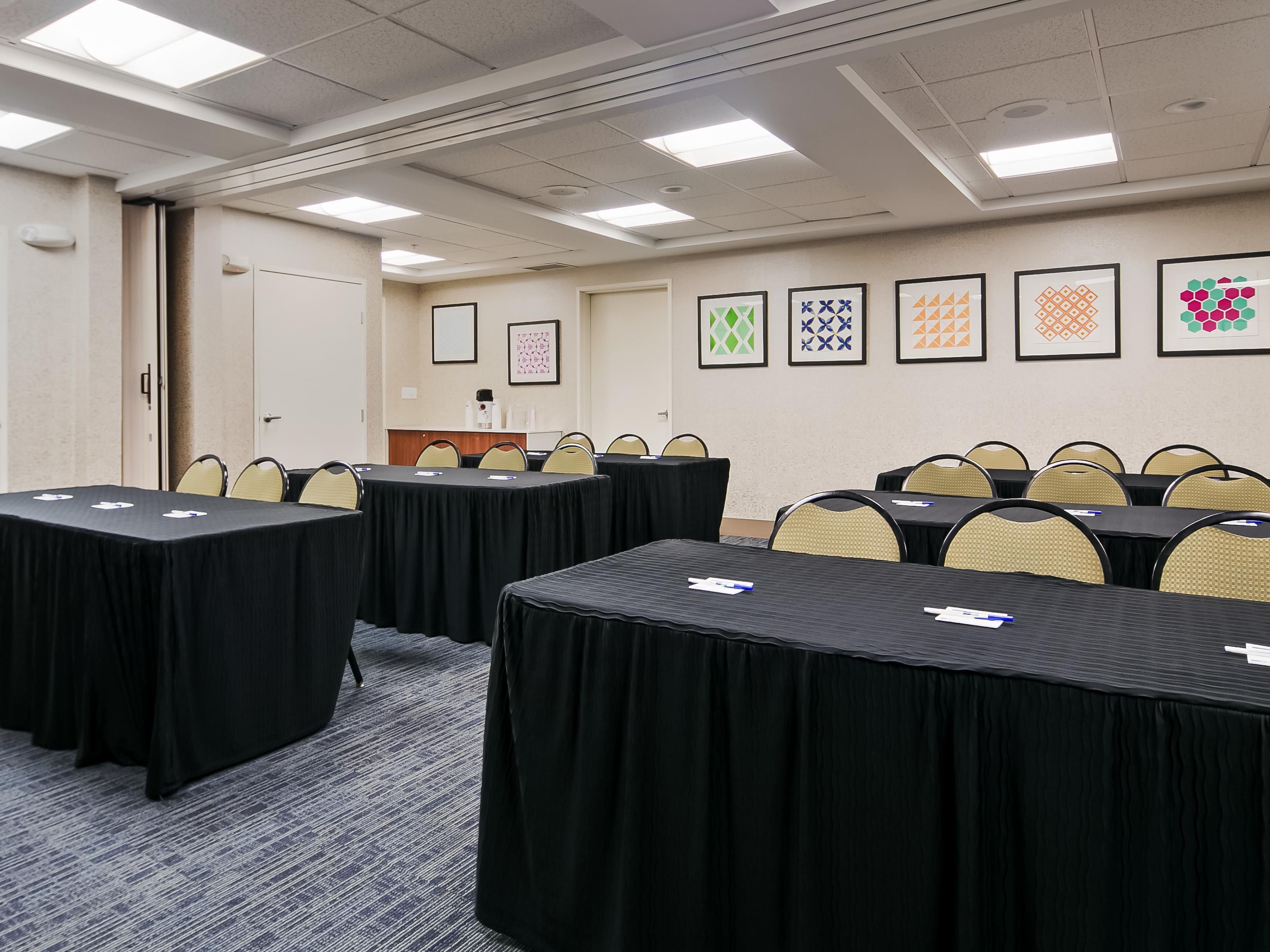 We offer 550 sq. ft. of flexible meeting space. This room can accommodate up to 40 people in theater Seating, and 24 people in classroom Seating. Please call to check space and the number of people we can accommodate. Our meeting room features a smart TV that connects to your laptop for presentations and ZOOM calls.