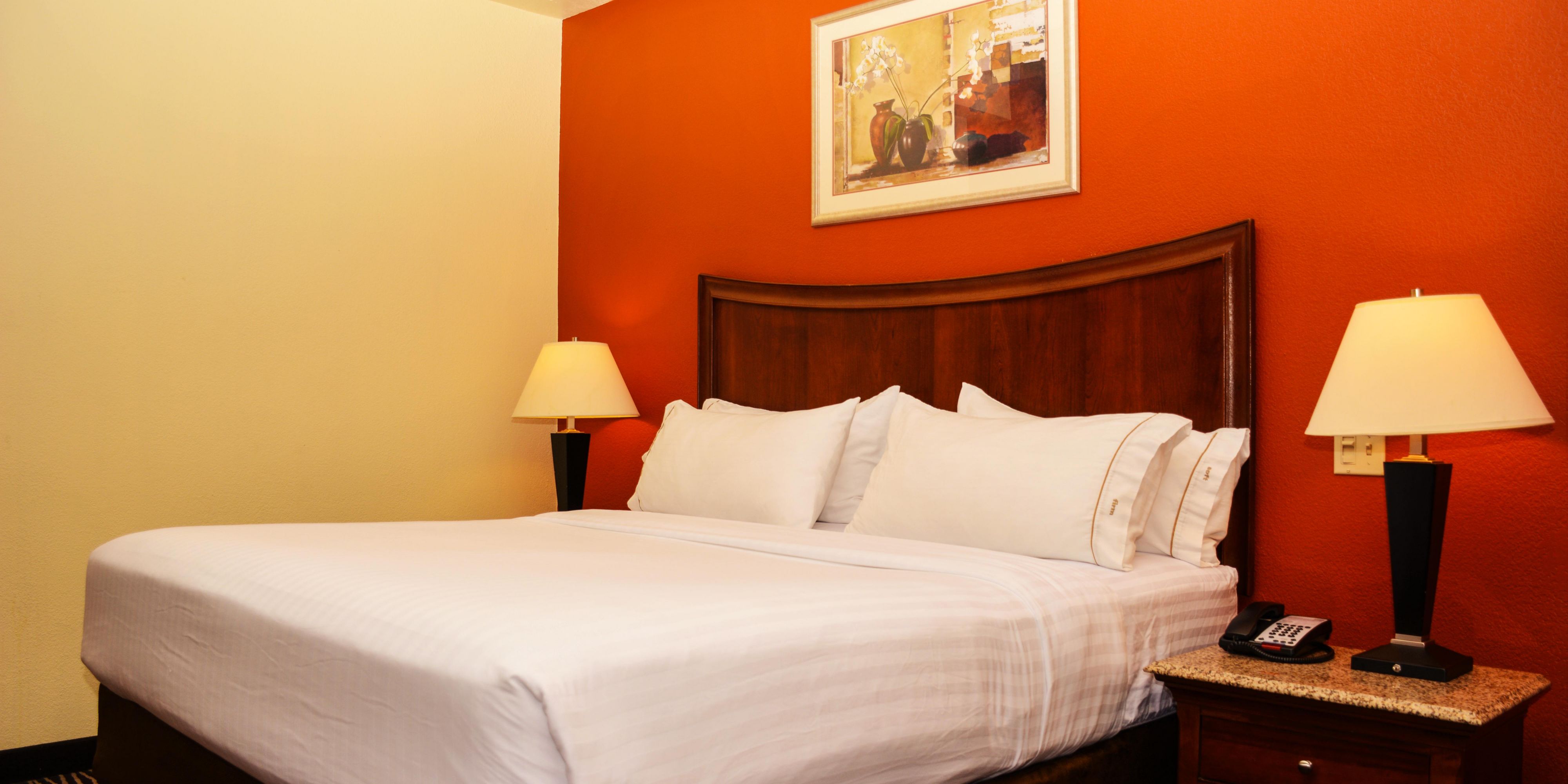 Our beds feature triple-sheeting with four pillows to provide you with a comfortable night's sleep. All of our rooms has high speed internet, mini fridge, phone, iron with iron board, hair dryer, work desk w/lamp, ergonomic desk chair, microwave and coffee maker for your convenience. Our Executive Suites also includes a Jacuzzi and fire place.