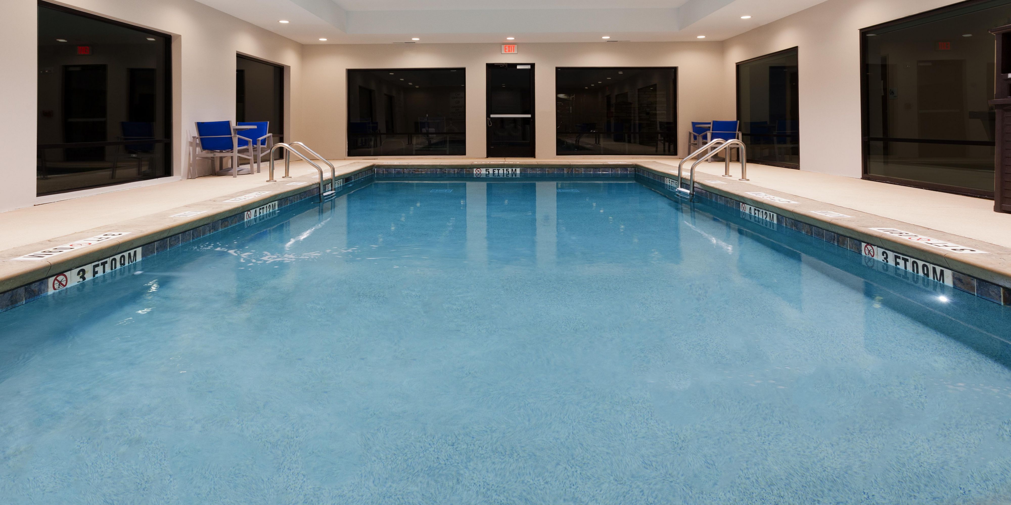 Unwind at our lovely indoor pool and patio.