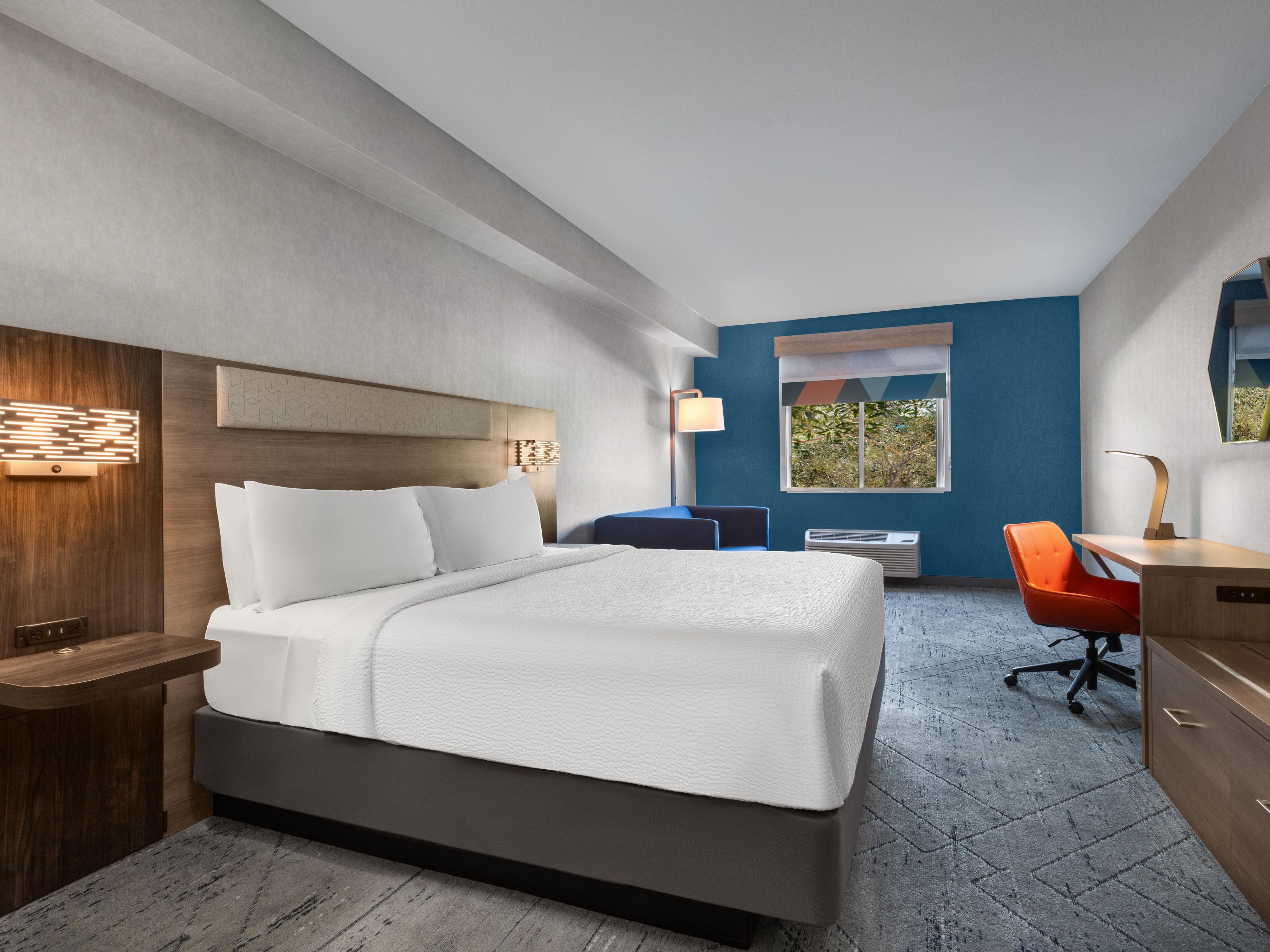 Recharge in a room designed for both rest and productivity.