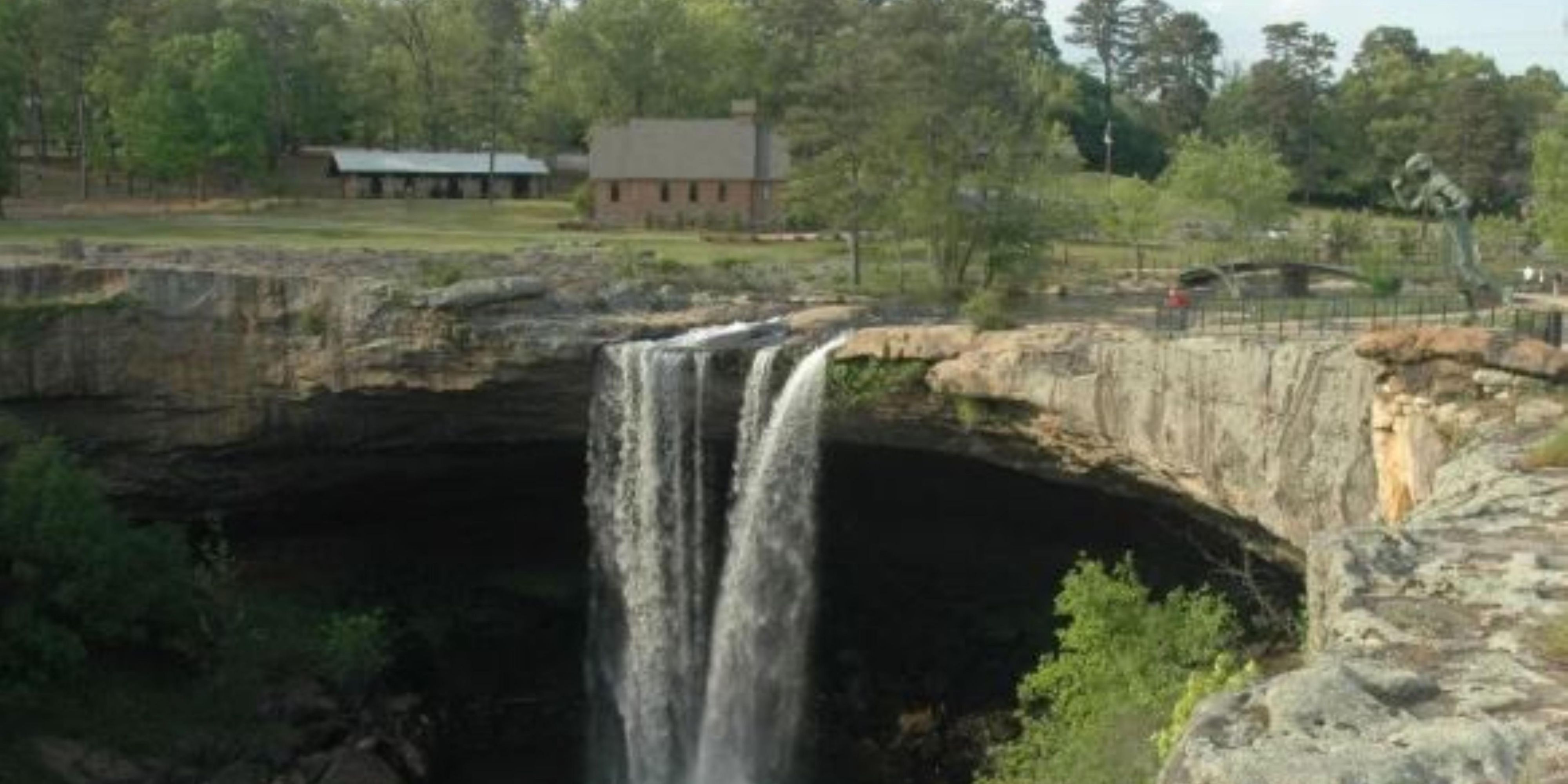 One of Alabama’s top attractions, Noccalula Falls Park welcomes thousands of visitors each year. The park features Black Creek walking, biking, and hiking trails, a petting zoo, botanical gardens, scenic train ride, mini-golf, fly fishing, and of course, the 90-foot Noccalula Waterfall.