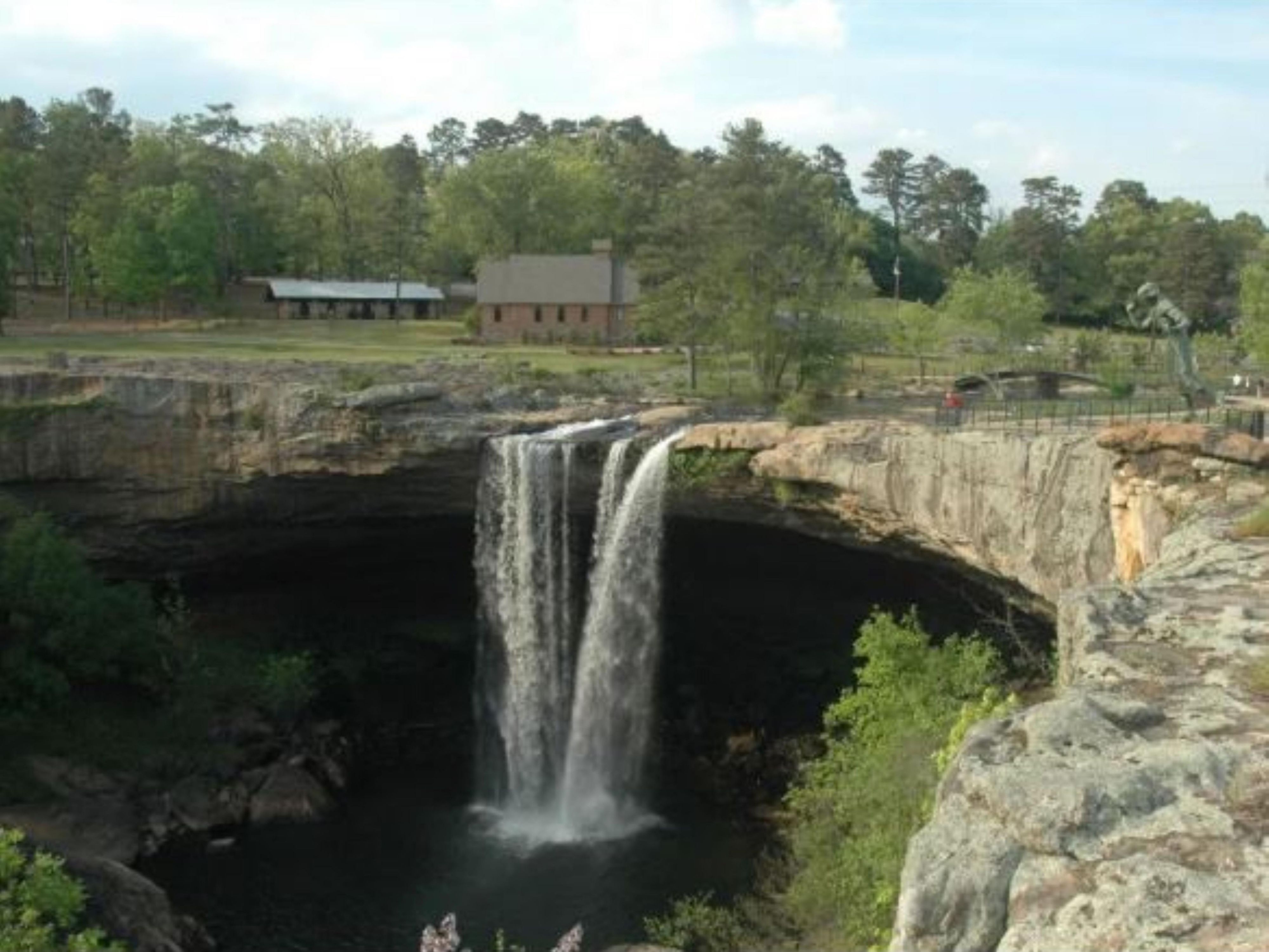One of Alabama’s top attractions, Noccalula Falls Park welcomes thousands of visitors each year. The park features Black Creek walking, biking, and hiking trails, a petting zoo, botanical gardens, scenic train ride, mini-golf, fly fishing, and of course, the 90-foot Noccalula Waterfall.