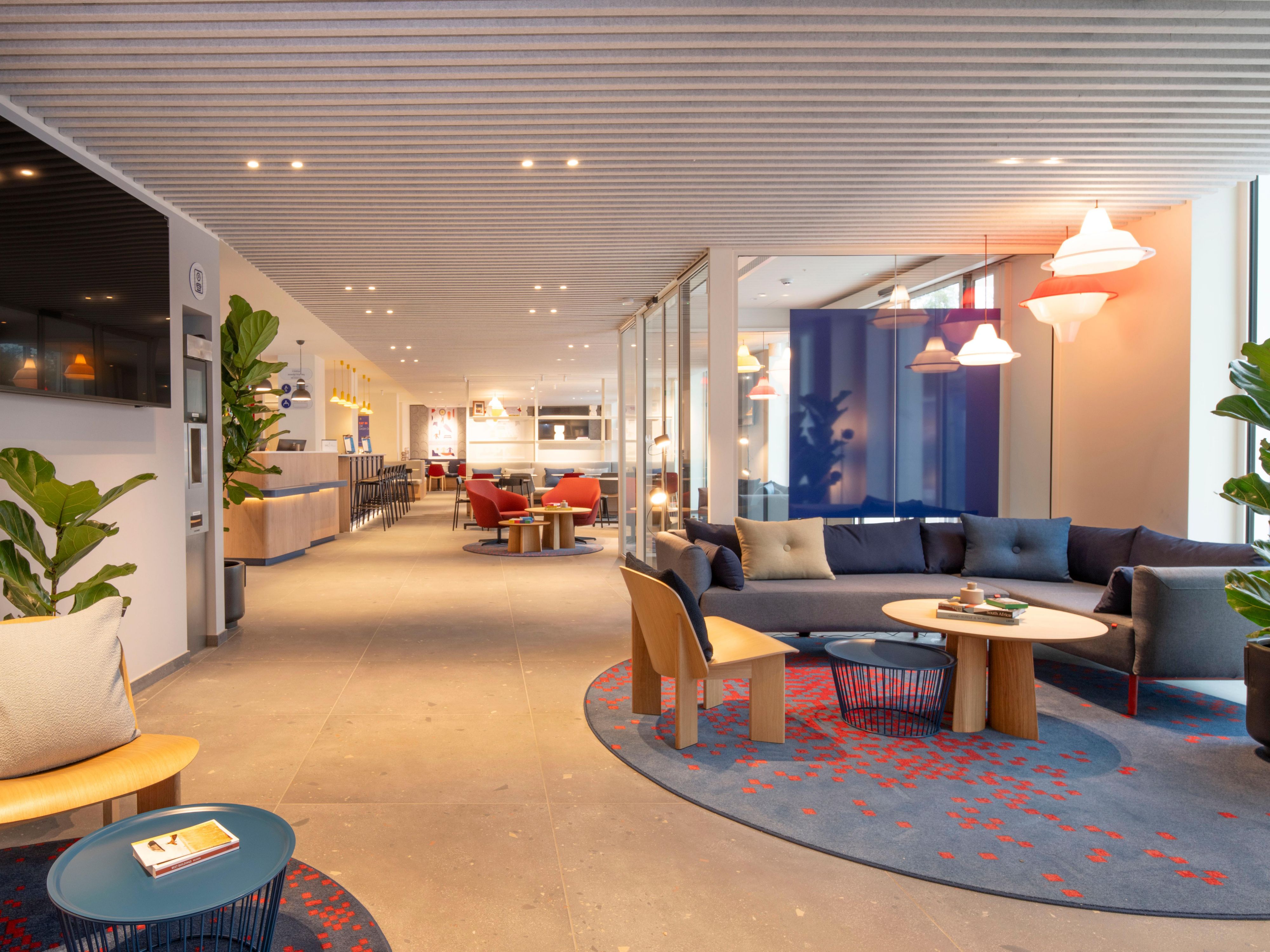 open lobby area with plenty of seating and lots of natual light