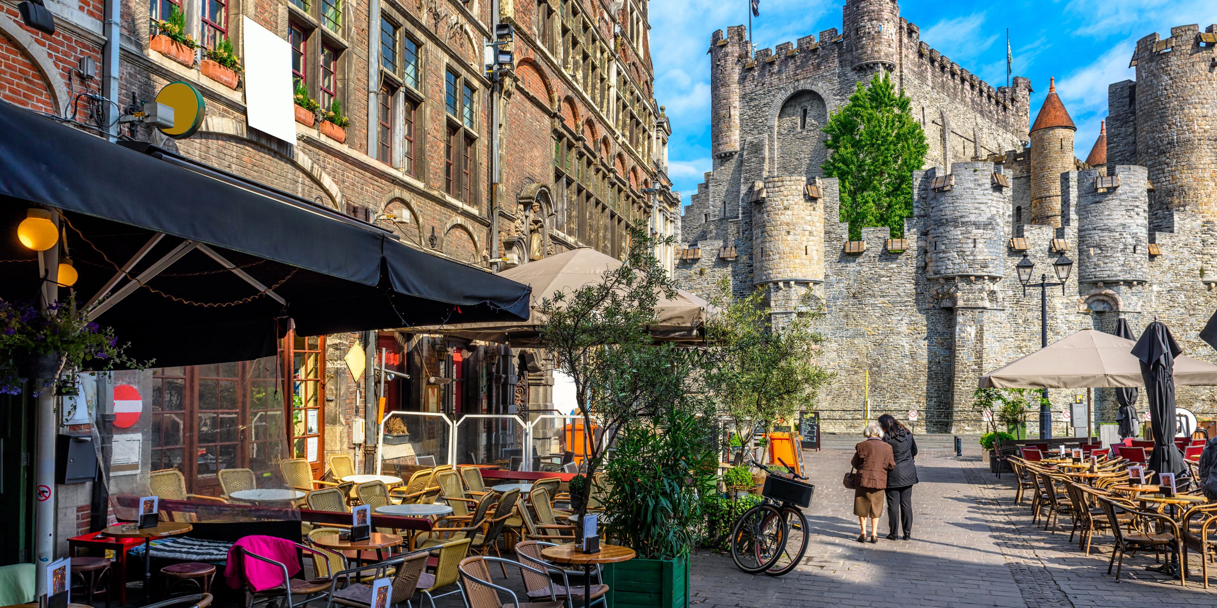 Ghent in summer with blue skies and a castle