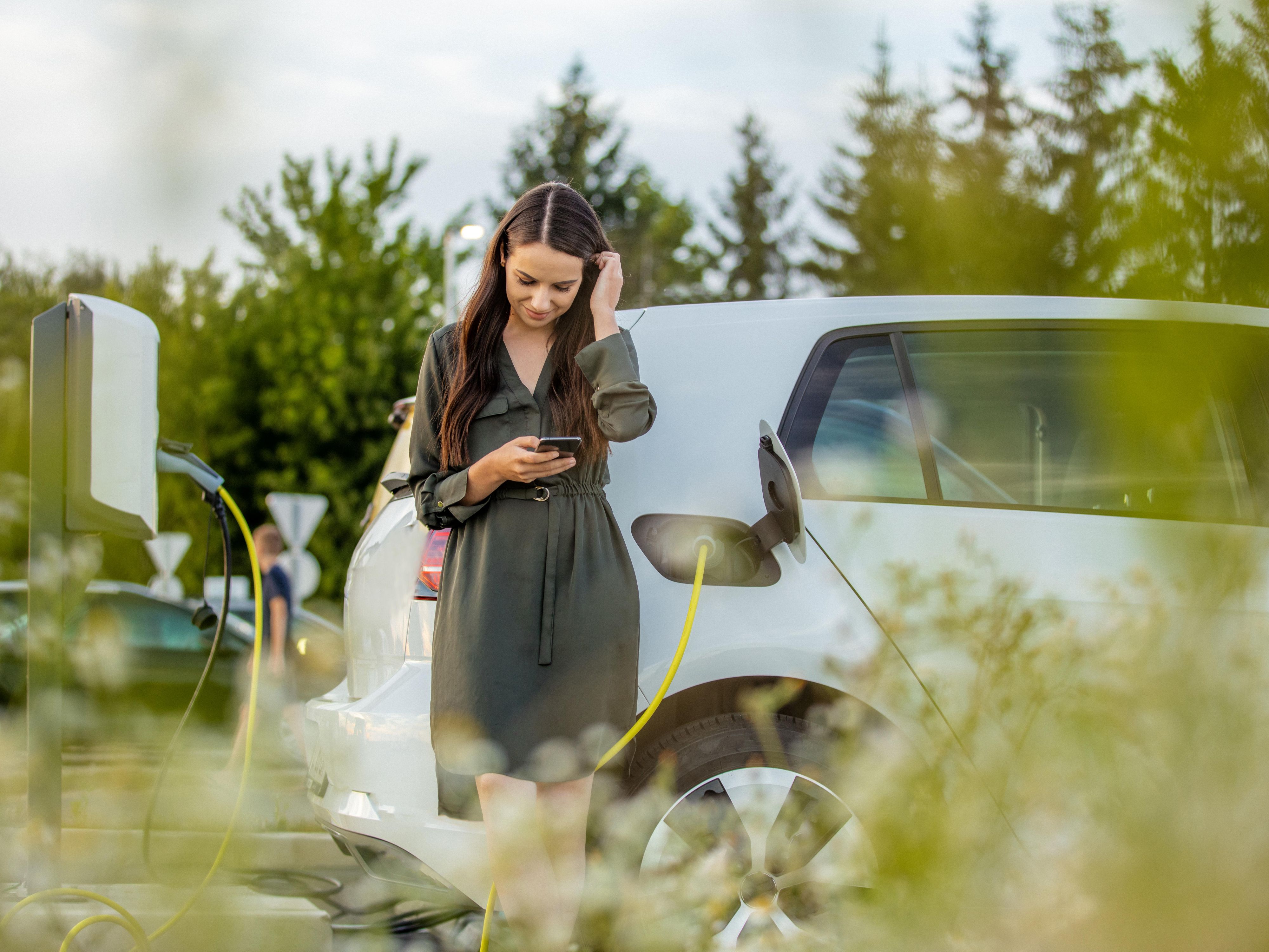 woman charging car
