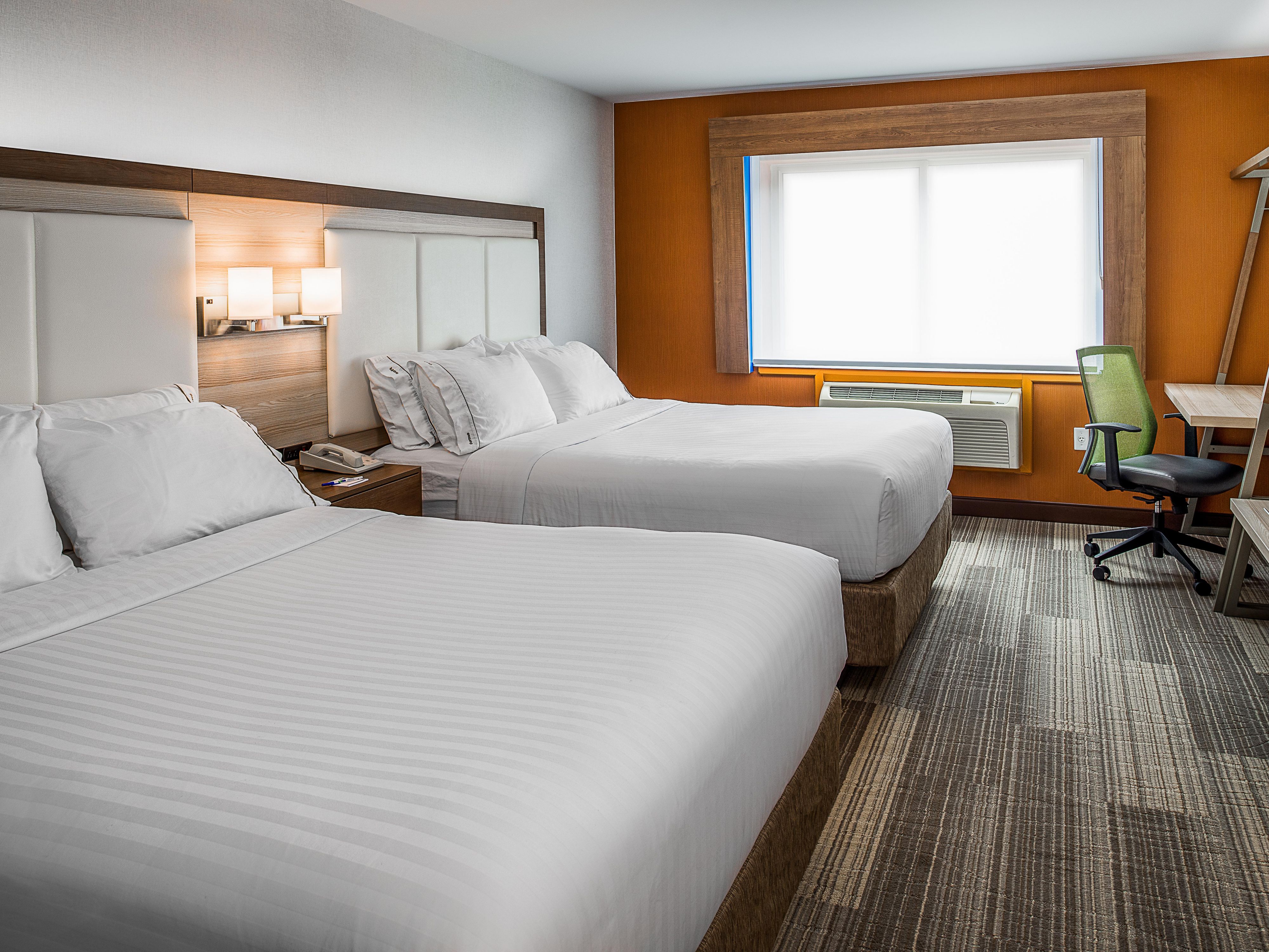 Two Queen beds can accommodate four people with comfort.