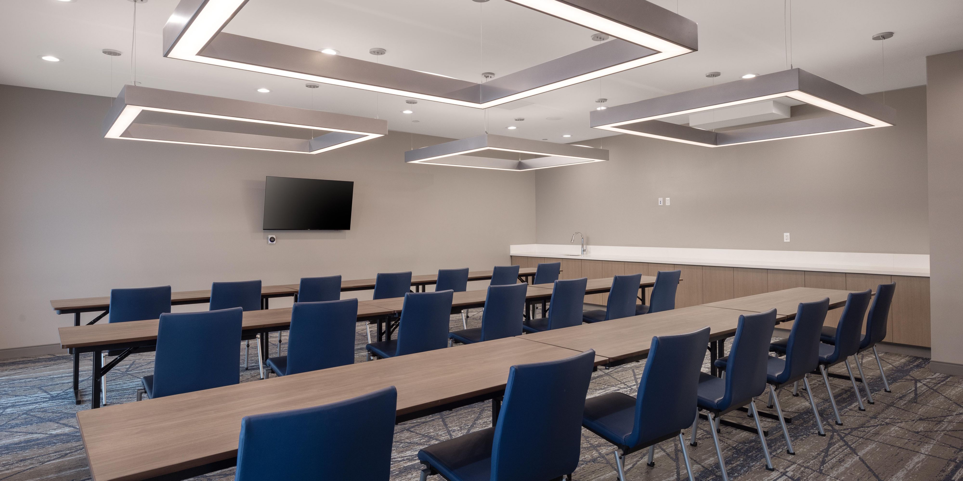 Our main meeting room is ready to use, equipped with a TV that is HMDI-ready. This space can be transformed into whatever will fit your needs; whether it be classroom style for training or even getting rid of the tables completely for a more open collaborative set-up.  
