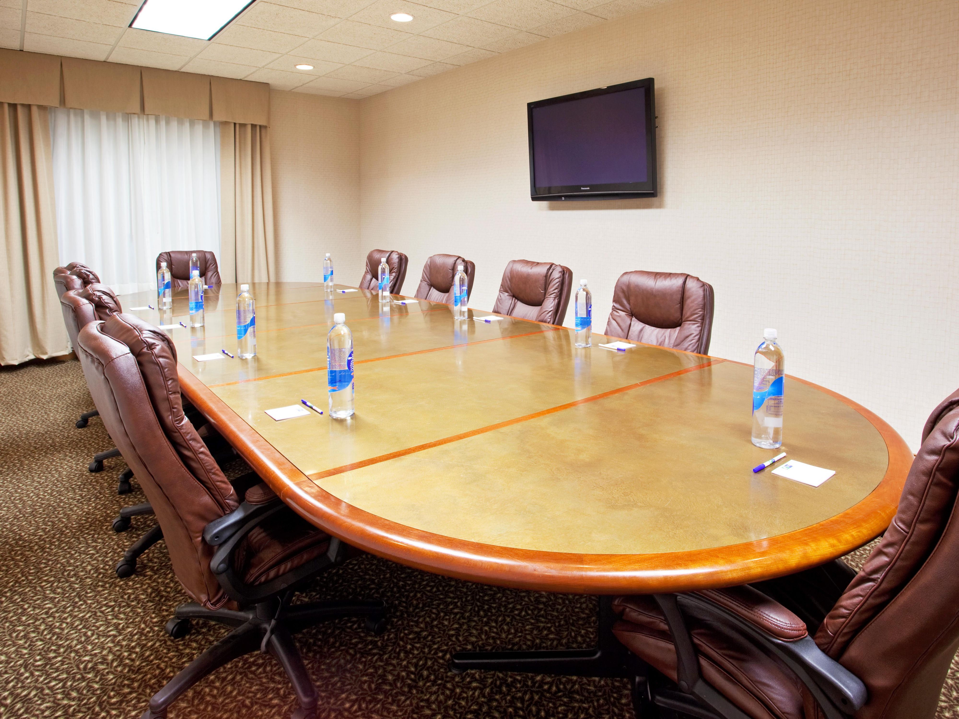 Our quaint 15-person board room is the perfect space for your group. Equipped with up-to-date technology including a teleconference line and flat-screen TV for presentations as well as a  kitchenette including a  refrigerator and microwave, complimentary Wi-Fi and Business Center is available for any of your office needs.