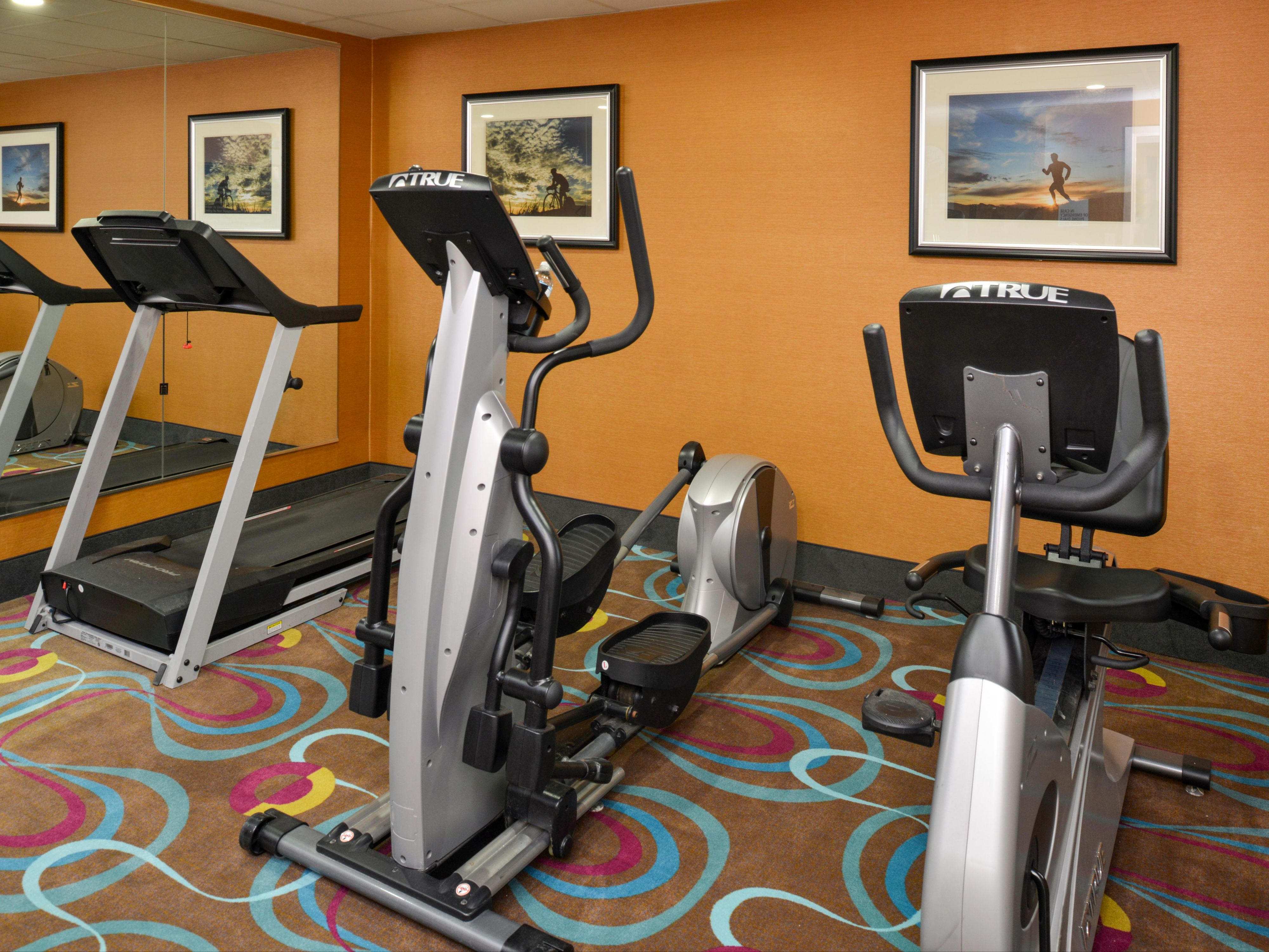 Modern Fitness Room with Extensive Options.