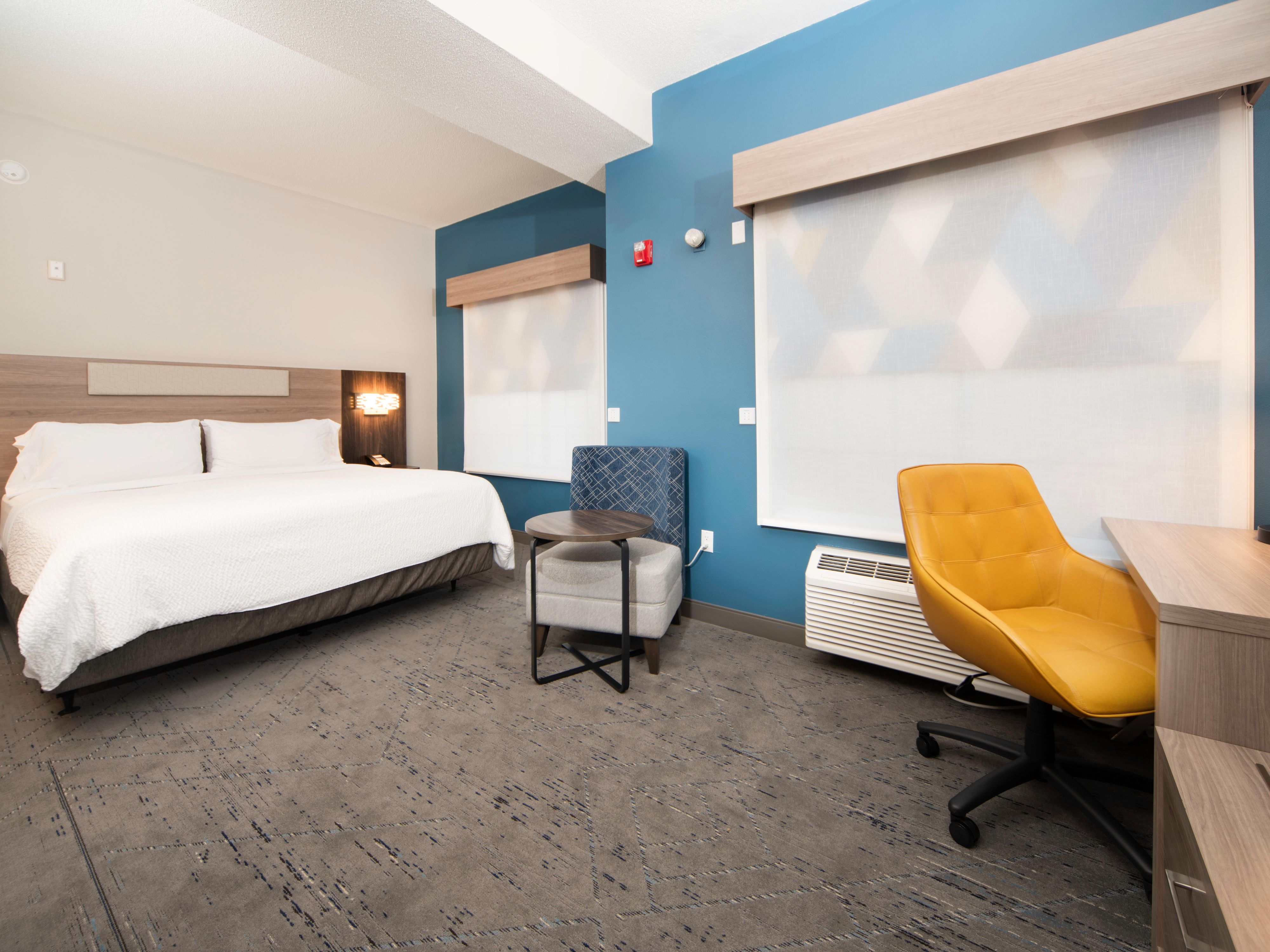 Experience the perfect balance of comfort and modern style in our newly renovated suites, thoughtfully designed for your convenience. Enjoy restful nights on plush bedding, stretch out on premium sofa sleepers, and take advantage of in-room amenities like a flat-screen TV, microwave, mini fridge, work desk, and complimentary Wi-Fi.