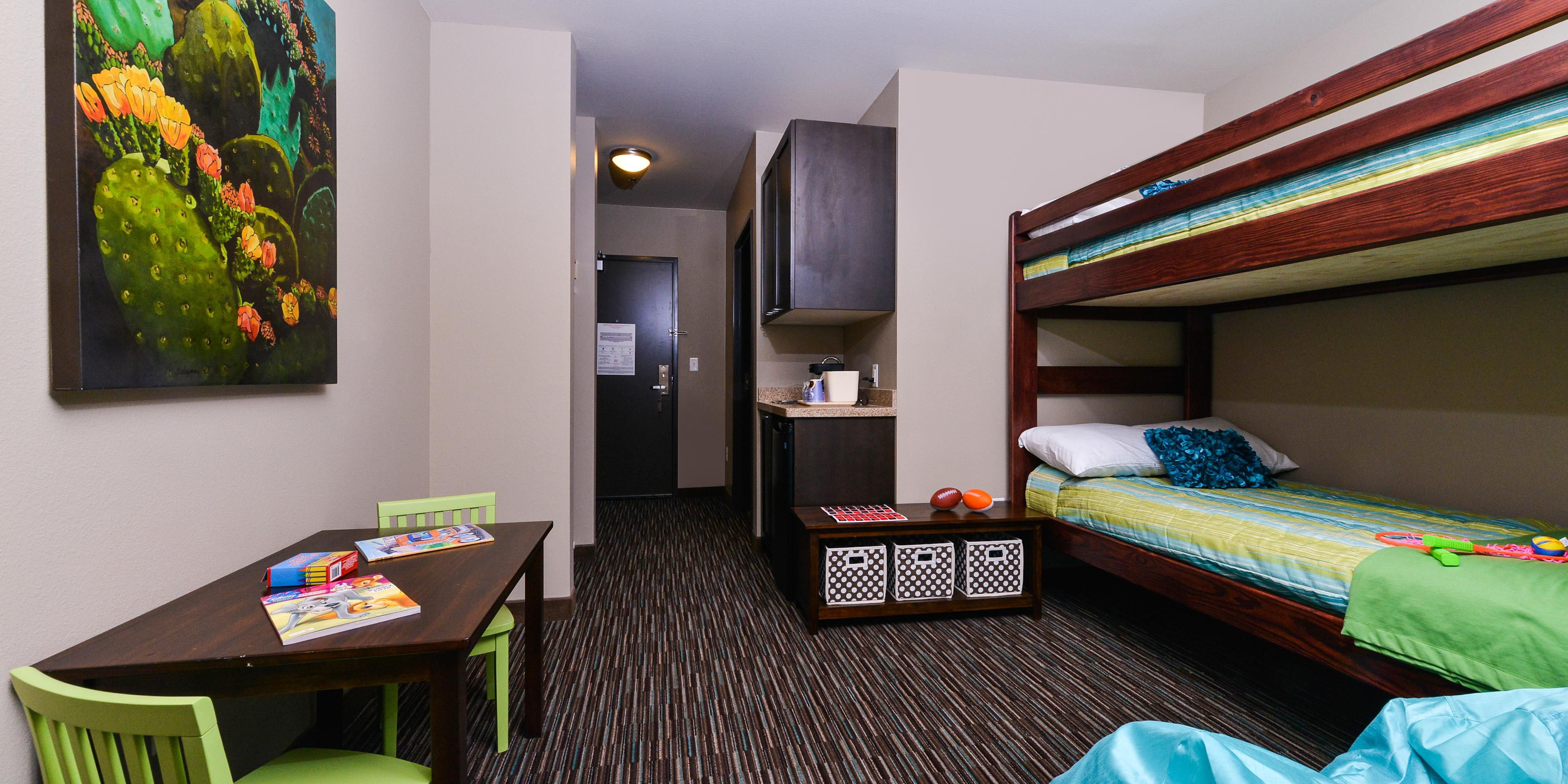 The Holiday Inn and Suites Indio offers a family suite equipped with bunk beds, perfect for your family getaway.