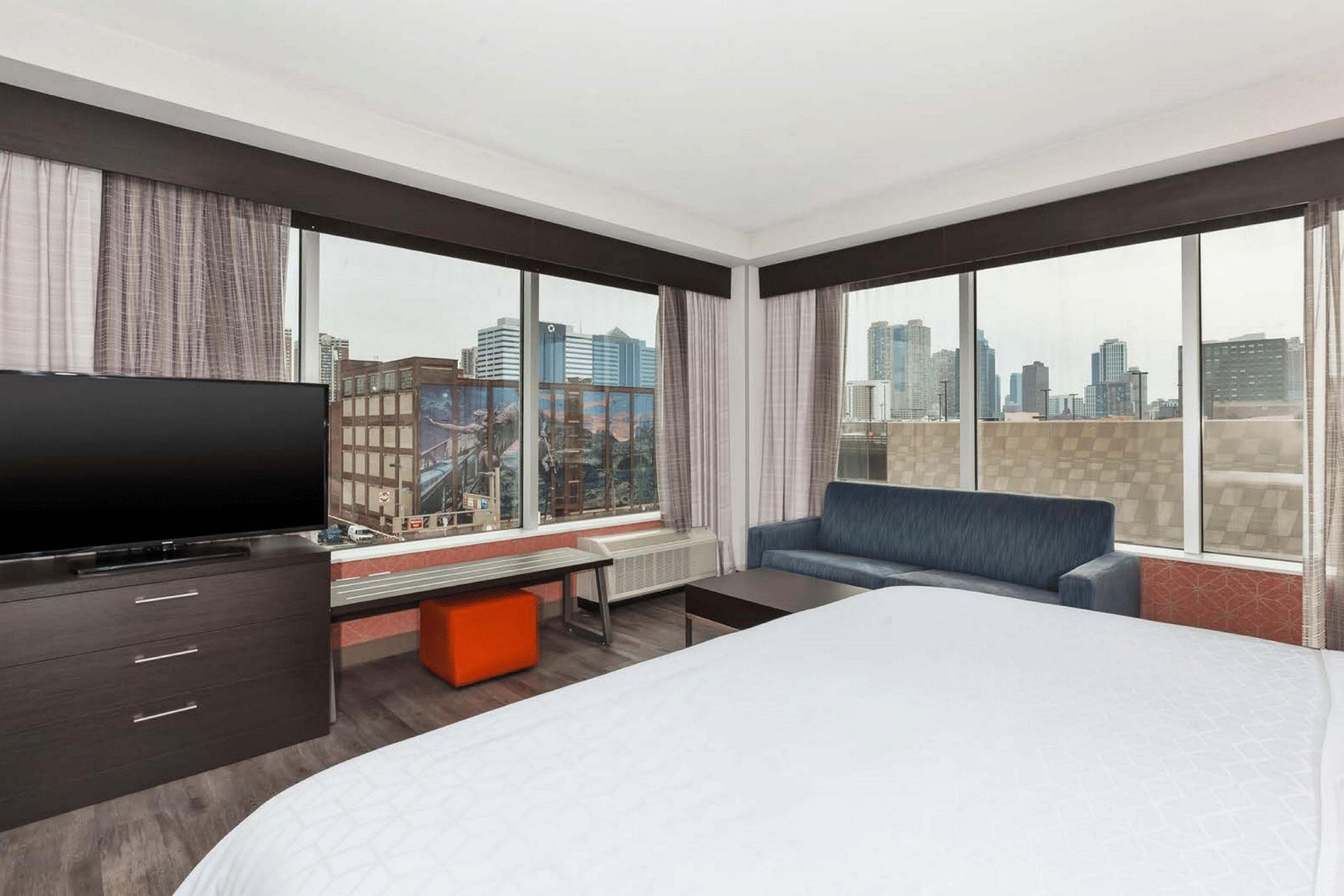 Guest room with panoramic city views