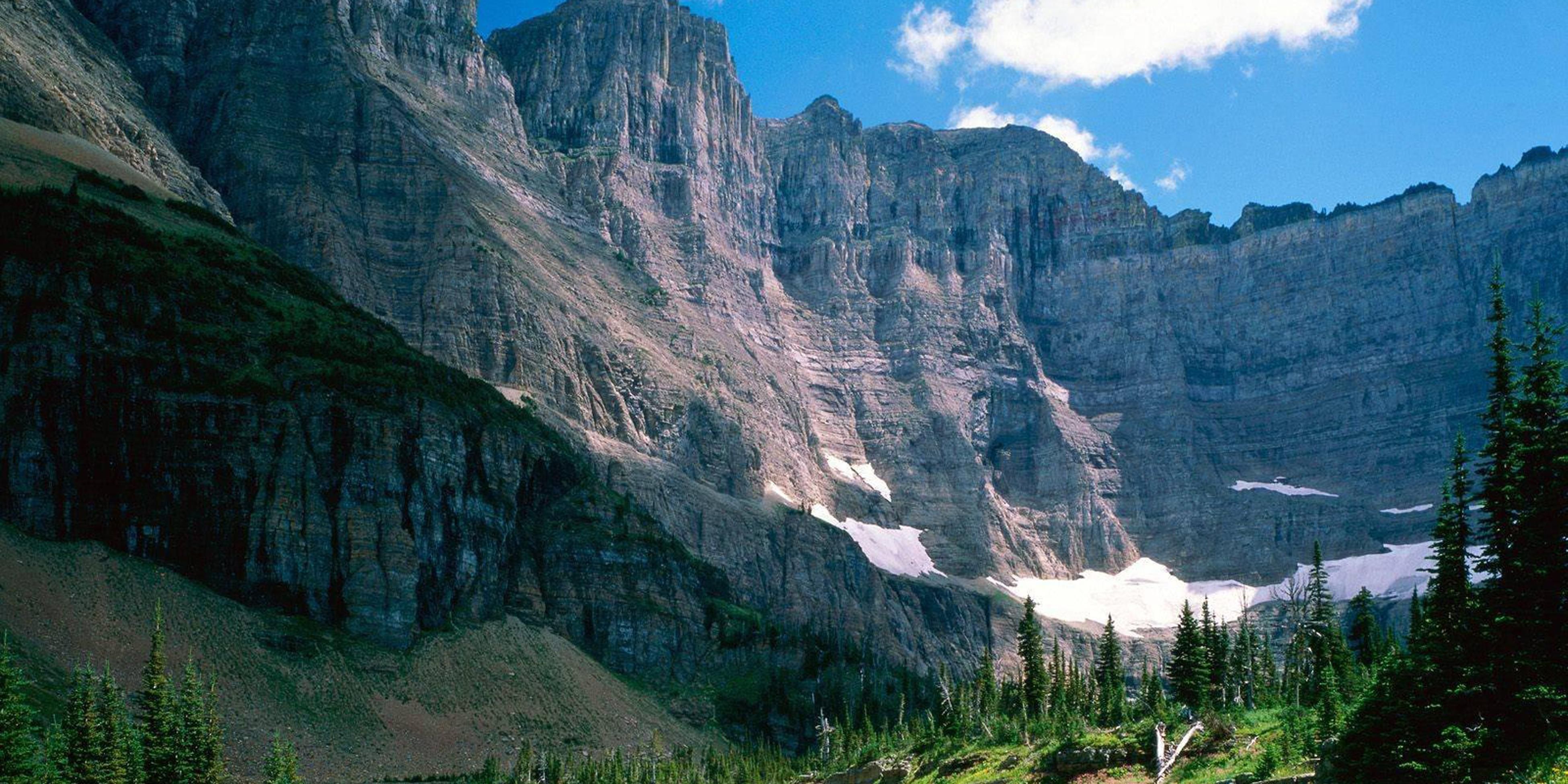 Glacier National Park provides over 700 miles of nature's splendor including mountains, lakes and meadows. What makes this park so unique is its relationship with Canada's Waterton Park, allowing visitors from both countries direct access to the area.