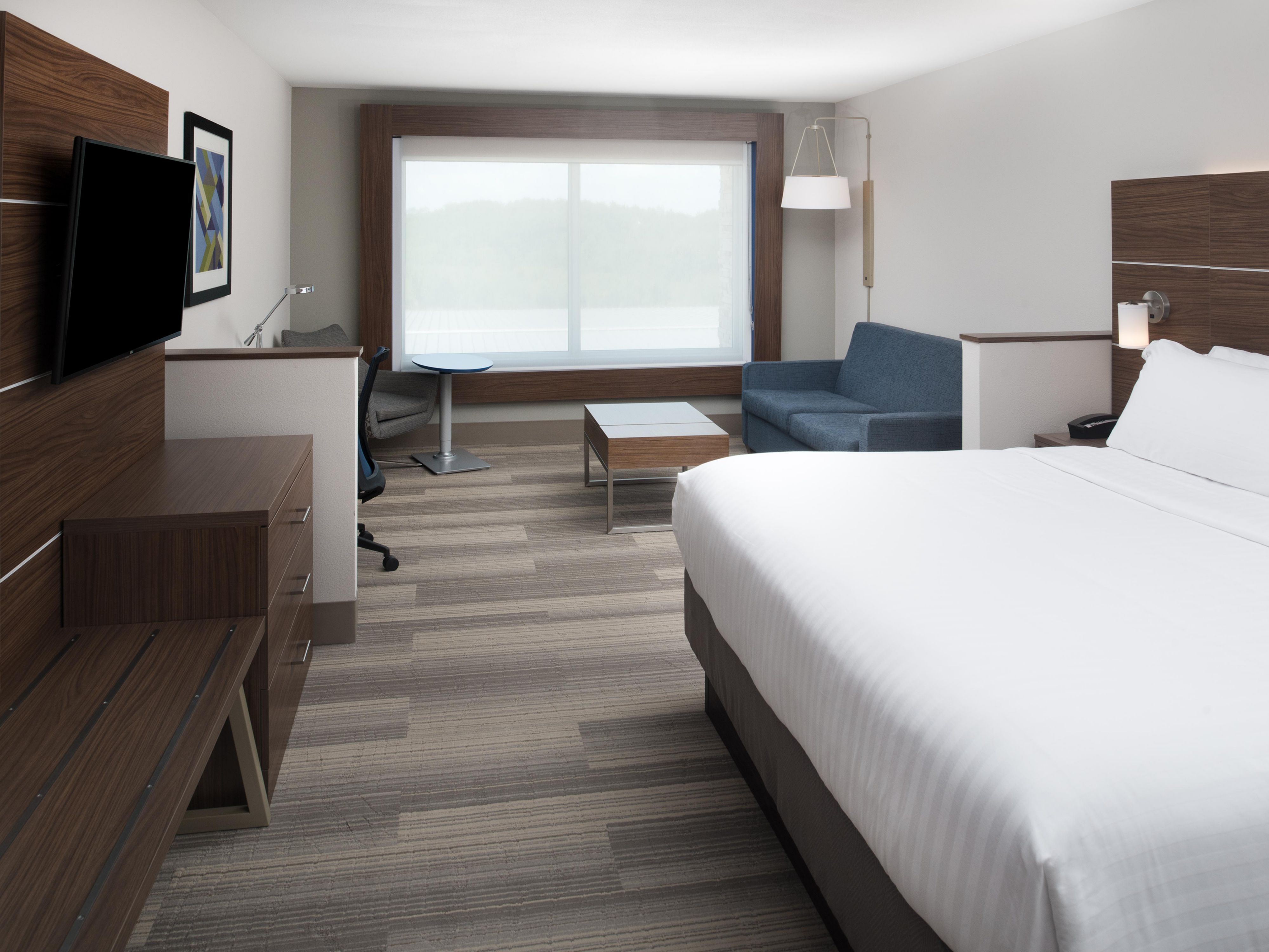 King bed suite with large desk space, sofa and FREE Internet