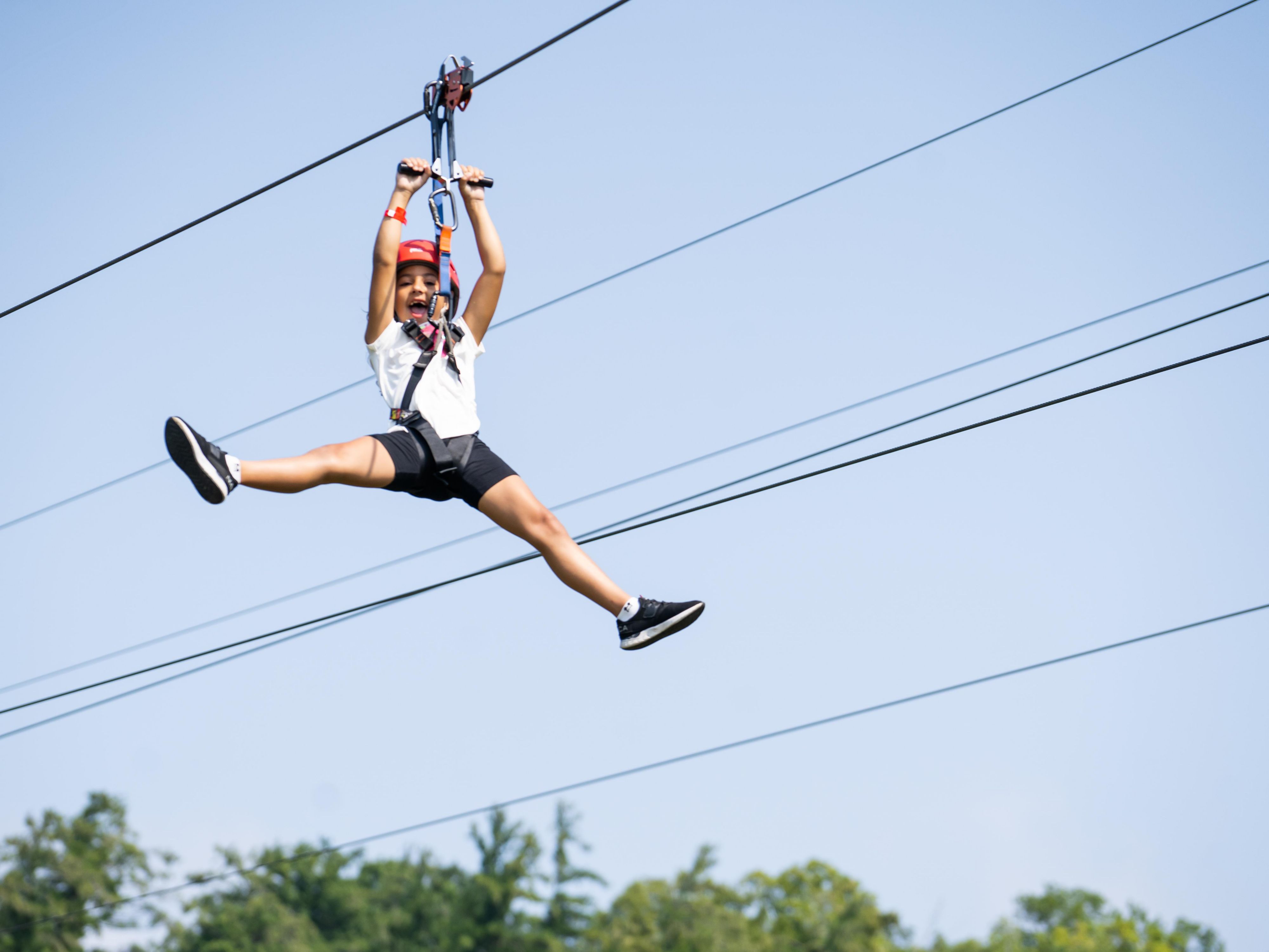 Get ready for an unforgettable adventure at Chicopee Tube Park! Their thrilling zipline lets you soar through the air down a mountainous slope. Perfect for families, groups, and friends. Make it a weekend with the Grand Adventure option combining ziplining, a peaceful canoe trip down the Grand River, and an overnight stay with us.