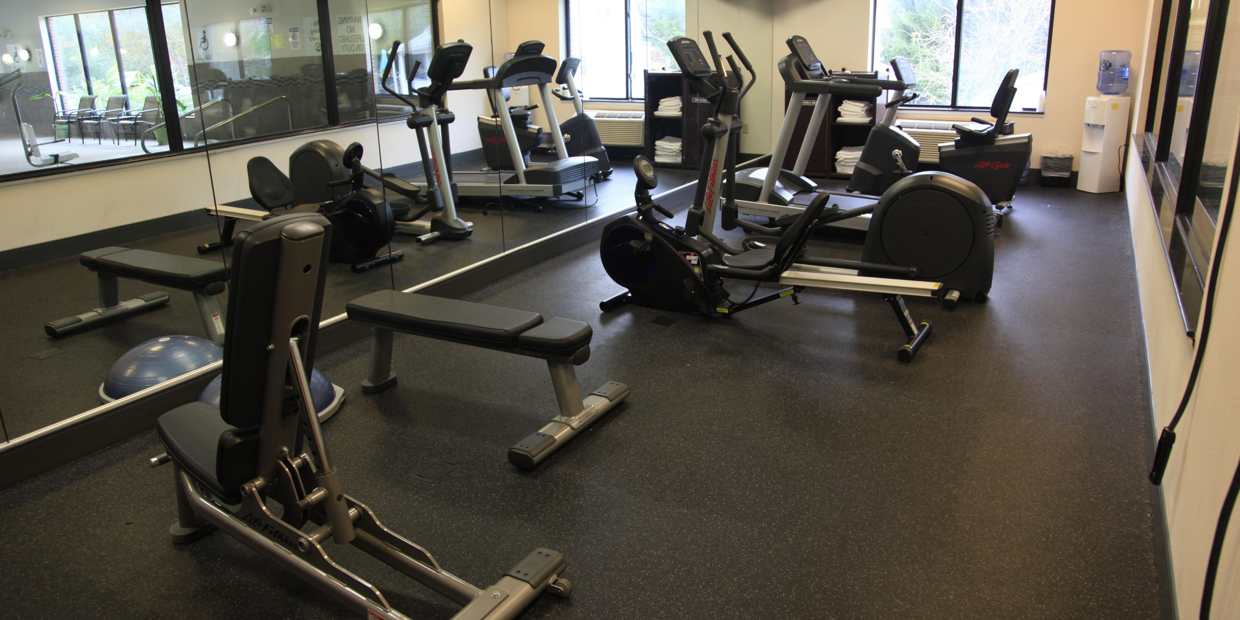 Stay active in our Fitness Center, open 24 hours a day, every day. Equipped with a treadmill, elliptical, stair-stepper, stationary bicycle, free weights, water station, towels, scale, and a TV. Our Fitness Center is complimentary to all guests.