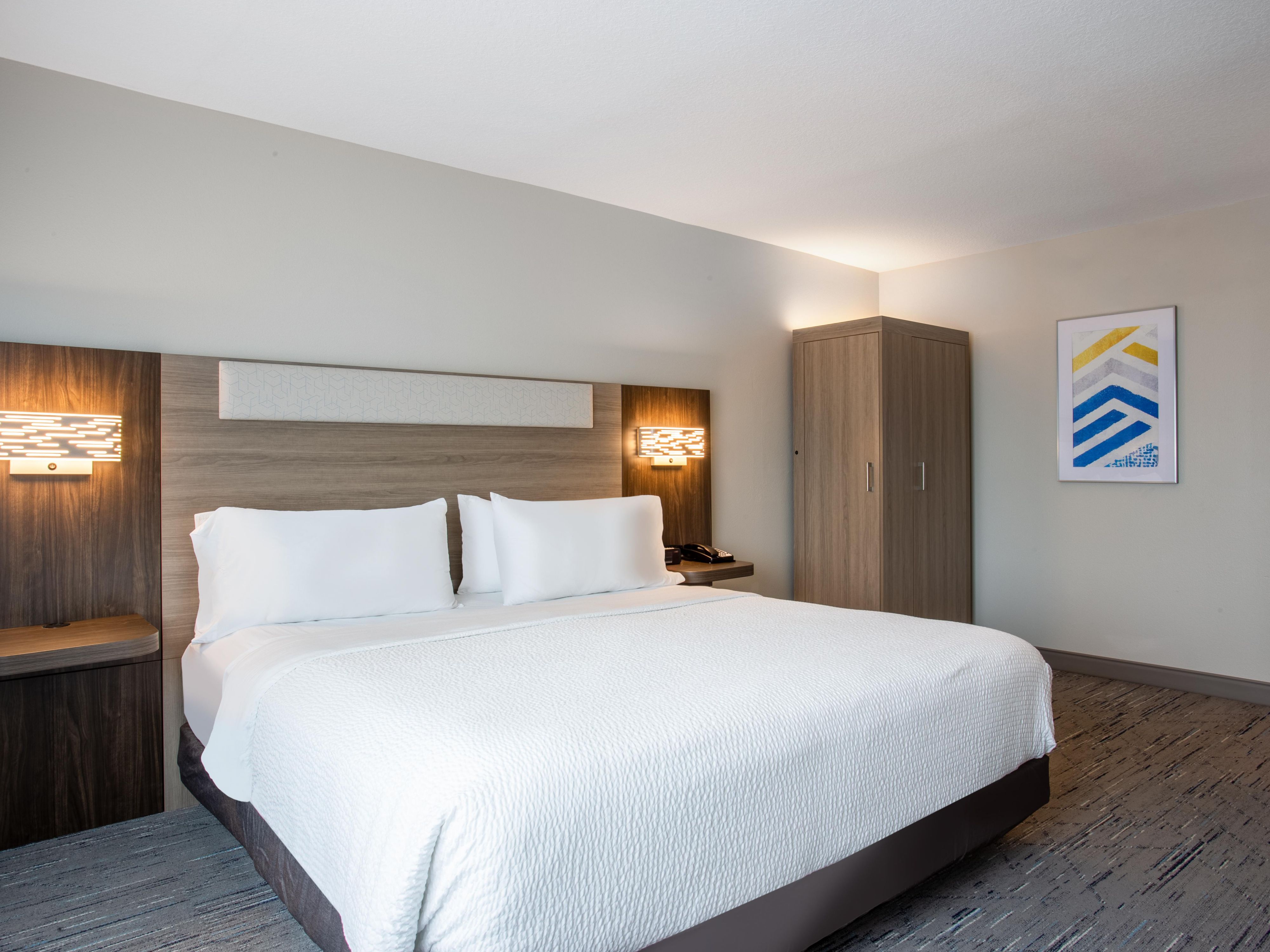 Unwind in our spacious standard king room with plush bedding.