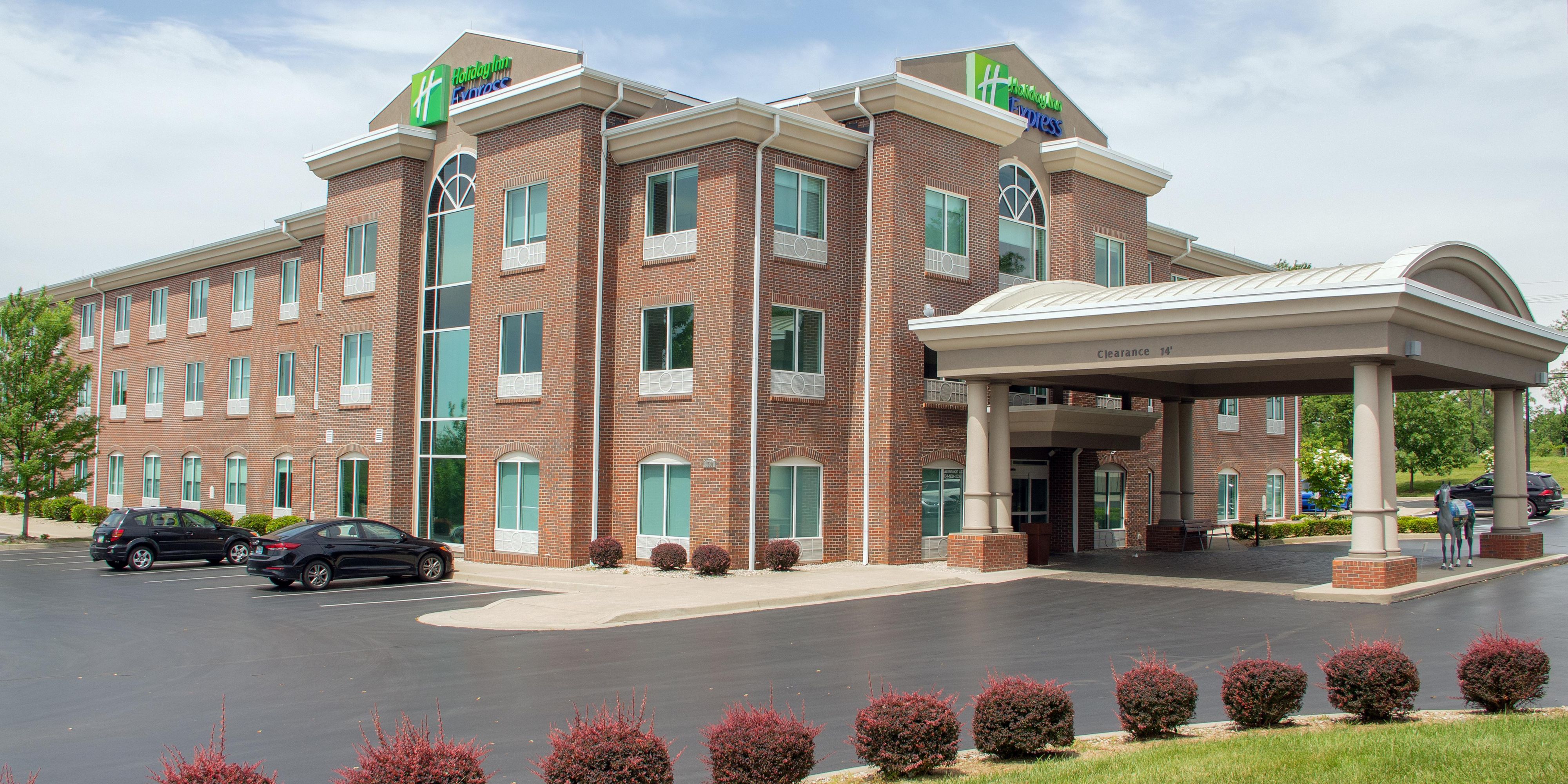 https://digital.ihg.com/is/image/ihg/holiday-inn-express-and-suites-lexington-6024946069-2x1