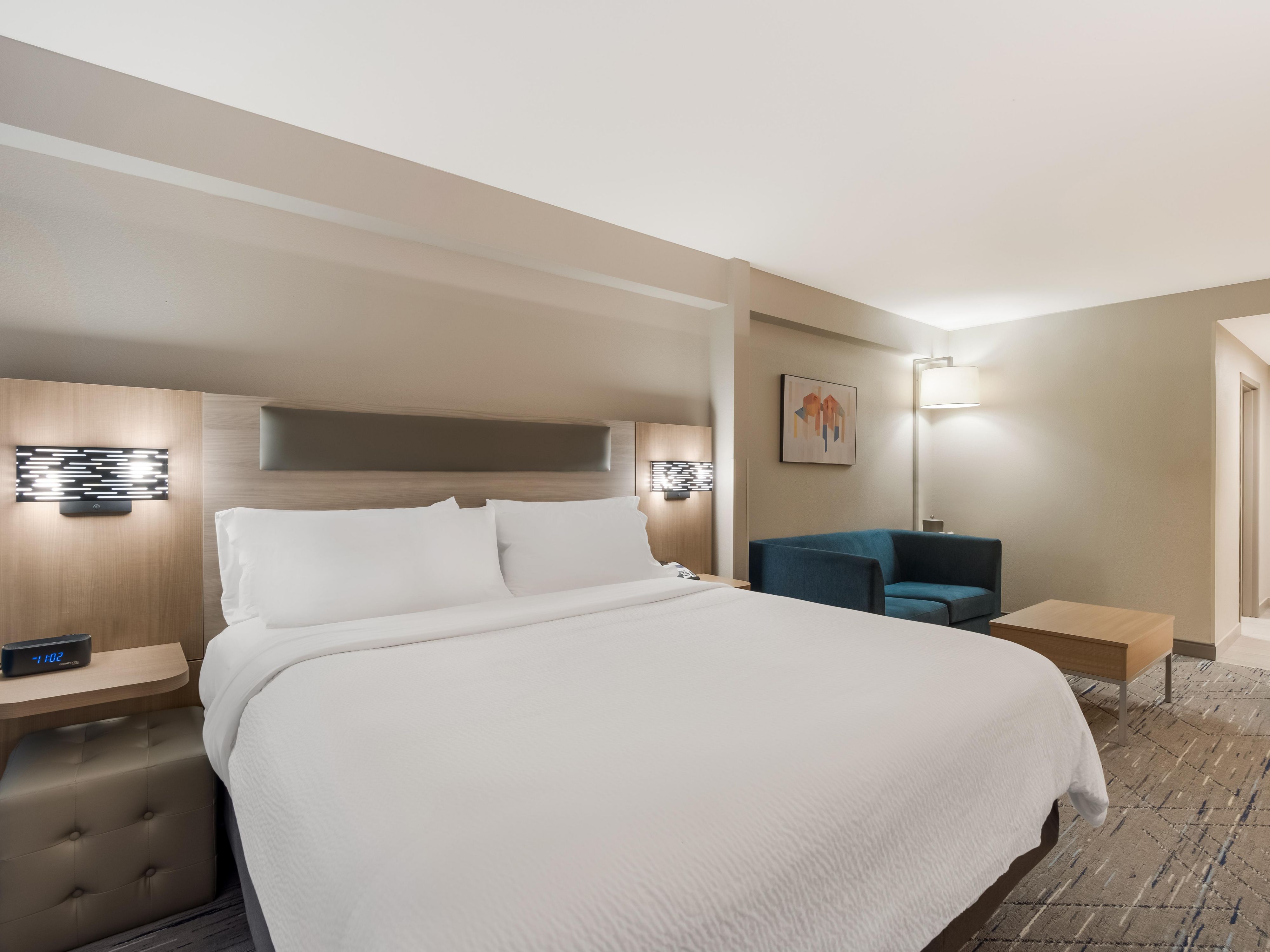 Relax In Our Spacious Guest Rooms With Plush Bedding
