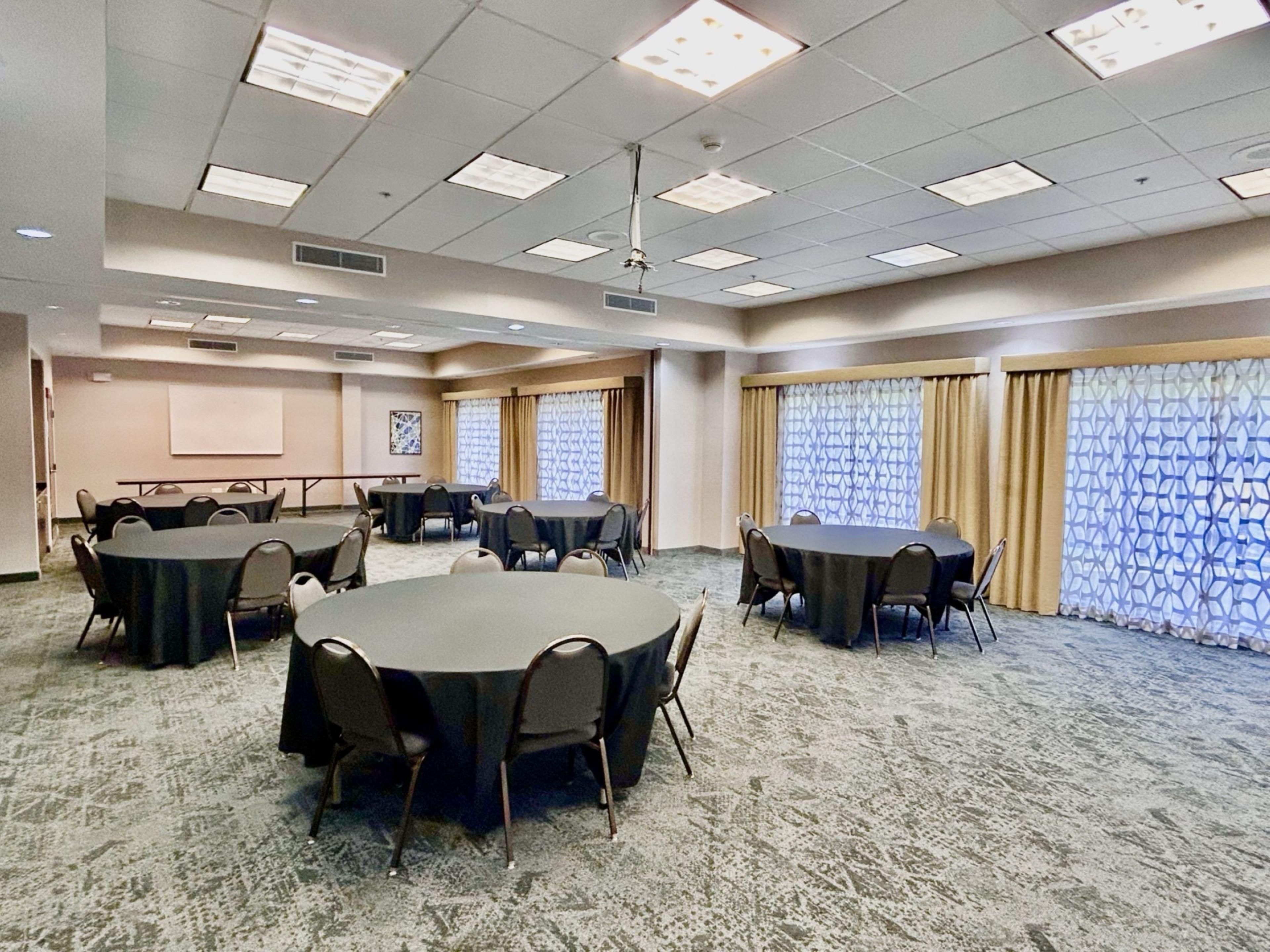 Celebrate or collaborate in style at our versatile venues in Lexington, ideal for weddings and events. Whether it's an intimate ceremony for 10 in our boardroom or a grand celebration for up to 60 in our interconnected Palmetto and Magnolia rooms, enjoy diverse layouts and cutting-edge technology for an extraordinary occasion.