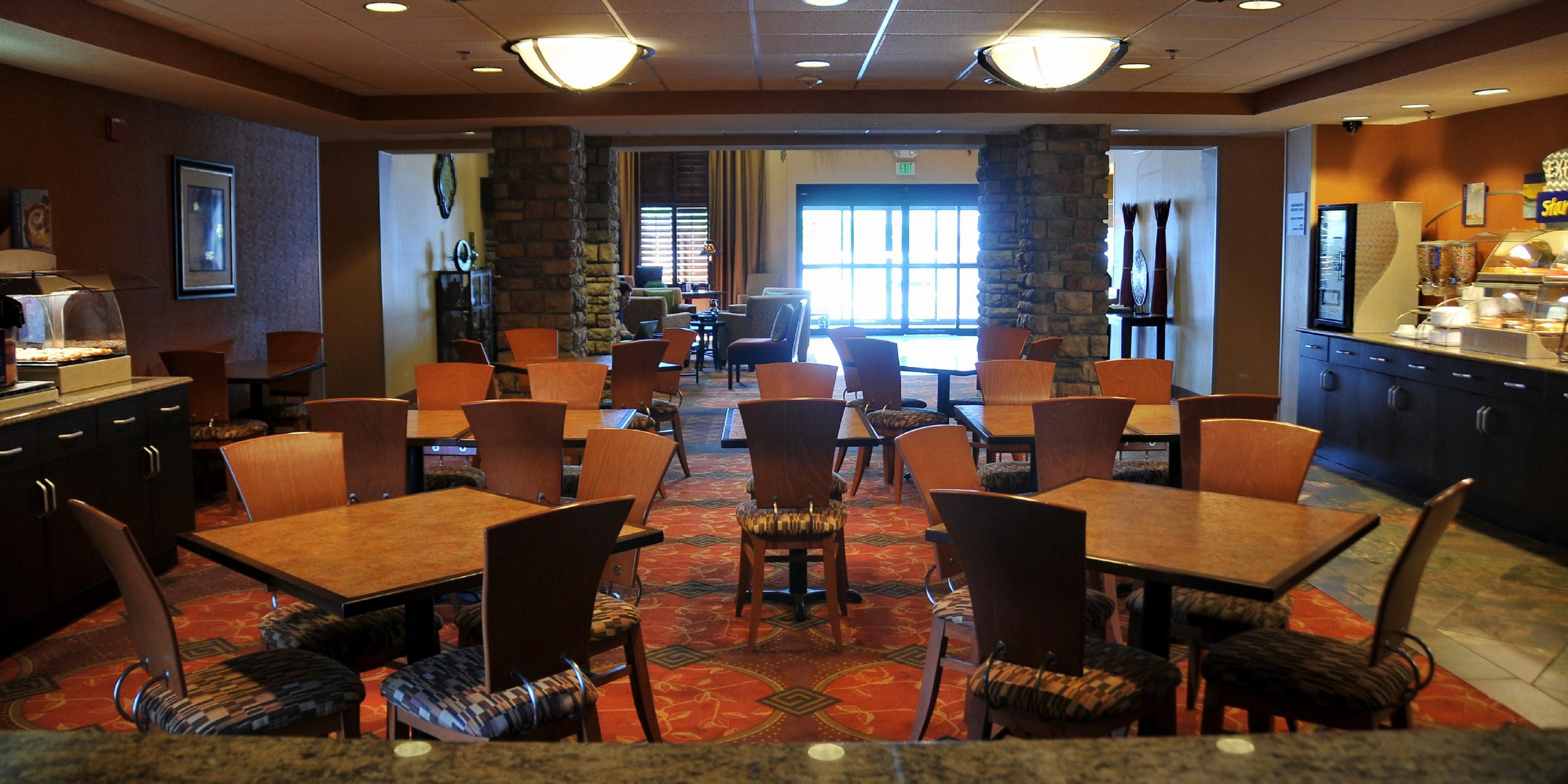 Our complimentary Express Start Breakfast bar offers a wide variety of hot & cold options including a rotation of egg & meat selections, biscuits or muffins, fresh fruit, our famous cinnamon rolls & Smart Roast coffee. You have to see it for yourself!