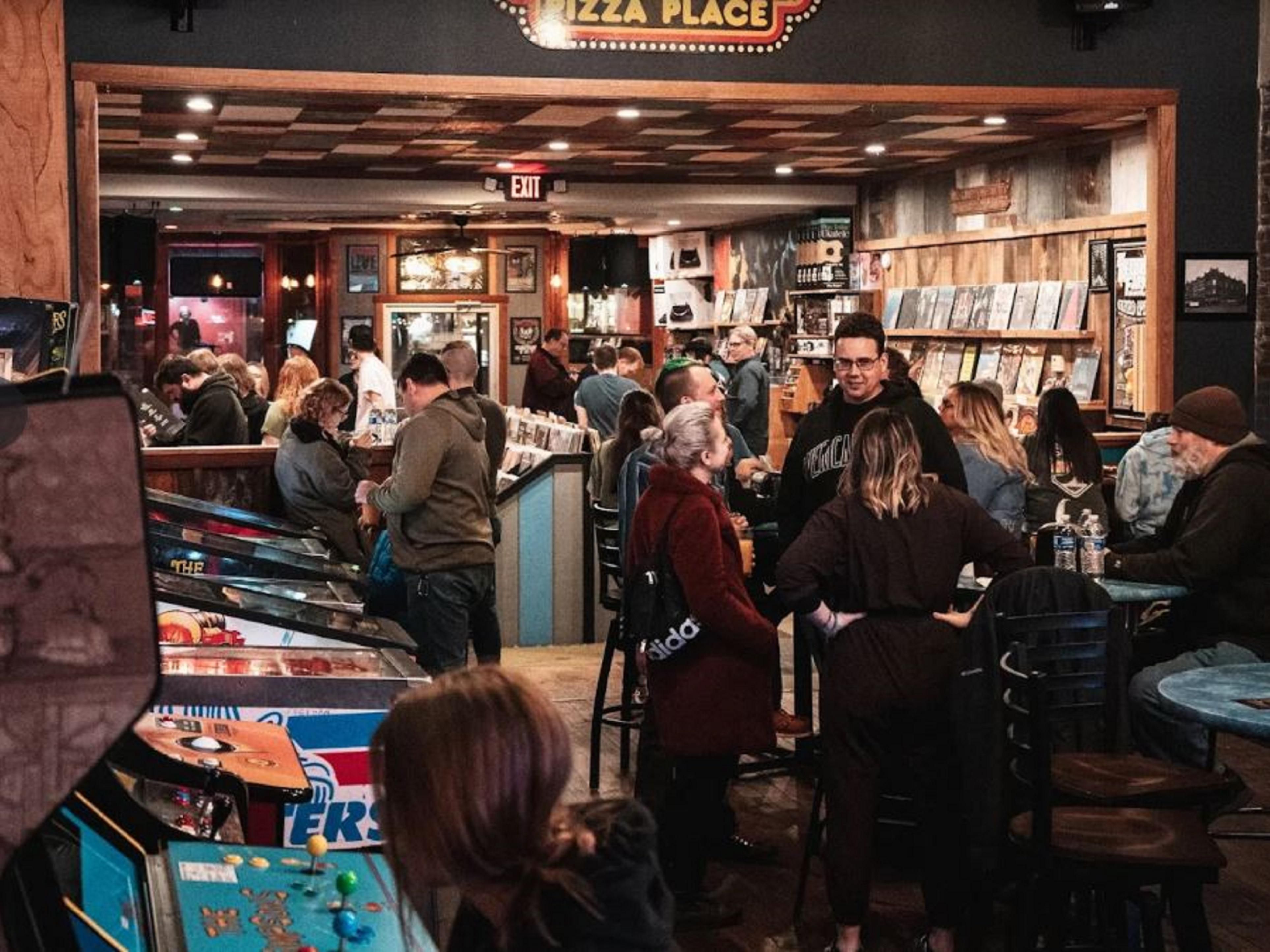 "THE BEST ALL-AGES ARCADE RESTAURANT ATTACHED TO A RECORD STORE WITH A GIANT ROTATING CRAFT BEER SELECTION IN INDIANA" ...and we agree. Live Music, great food, great atmosphere. Stay with us while you check them out!