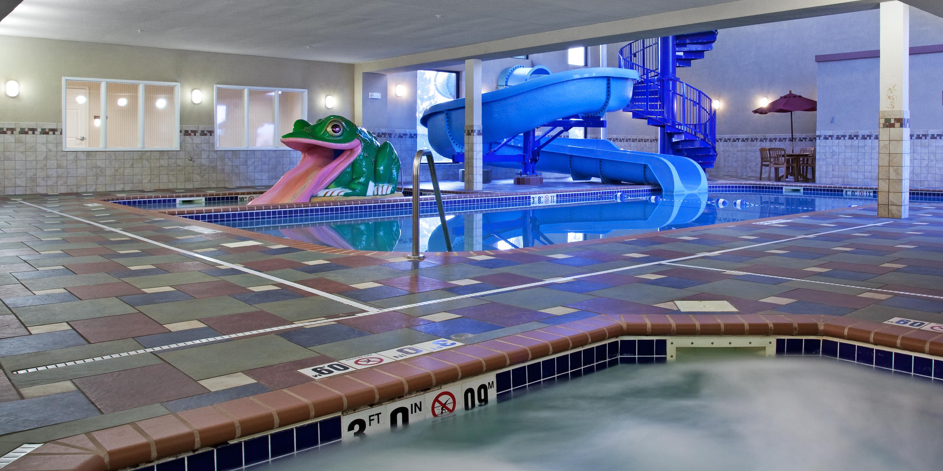 Our guests love our pool area! We have a waterpark-style slide, a kiddie pool with their own slide, a large swimming pool, and a separate hot tub. Something for the whole family! Book your stay with us and enjoy some great recreation without leaving the hotel. 