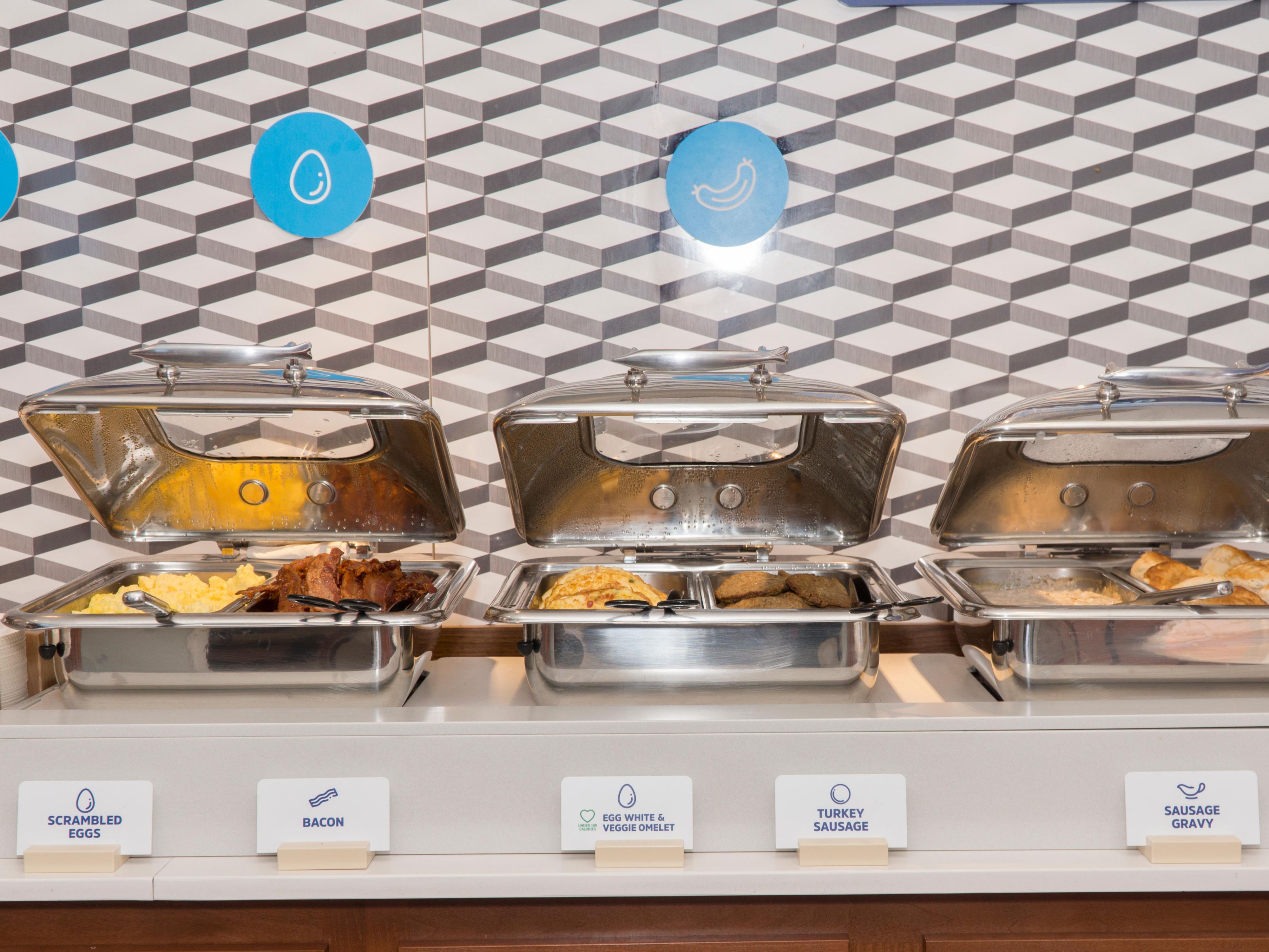 The Holiday Inn Express offers one of the best breakfast buffets in the area. Enjoy both hot and cold items each day. Hot items include Veggie and Cheese Omelets, Fluffy Pancakes, Cinnamon Rolls and Turkey Sausage every day. Scrambled Eggs, Cheese Omelets, Crispy Bacon, Pork Sausage, Biscuits, and Sausage Gravy rotate each day.