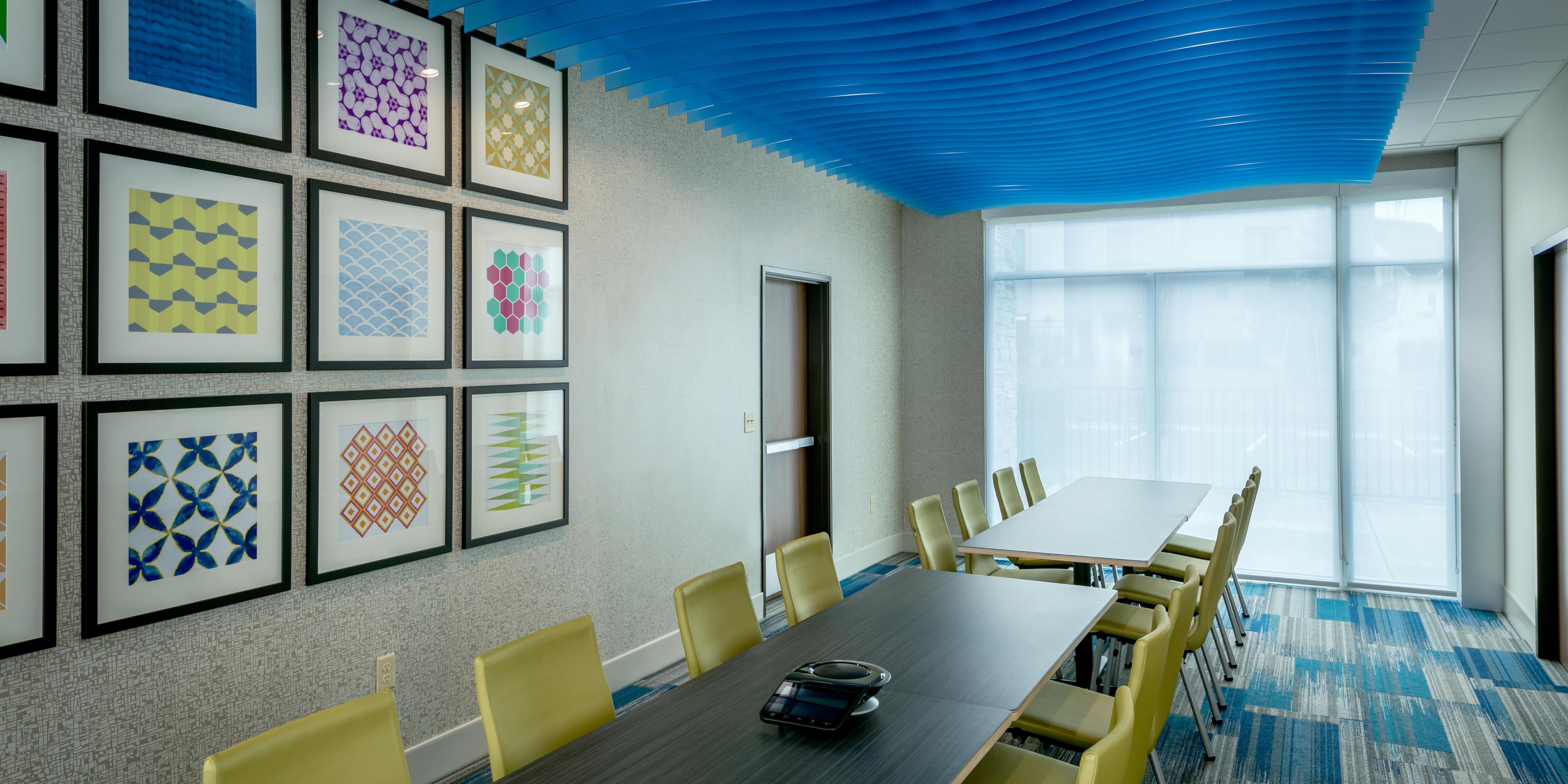 Our modern meeting room is the perfect fit for your next meeting or get together. With a max capacity of 25 people, your set up for success!