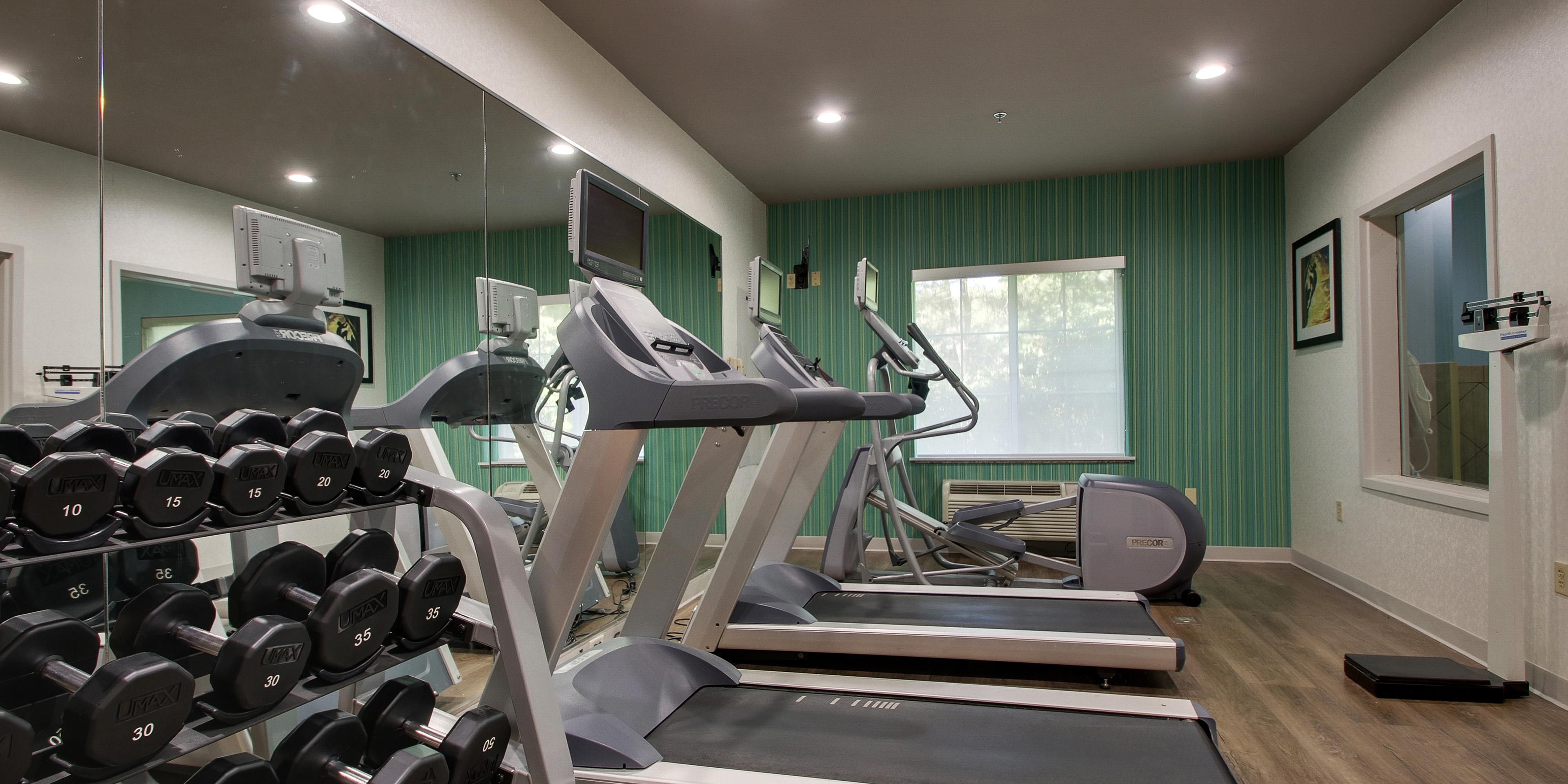 We offer a 24-hour fitness center with an elliptical, treadmill, and free weights to keep up your workout while you are away from home. 
