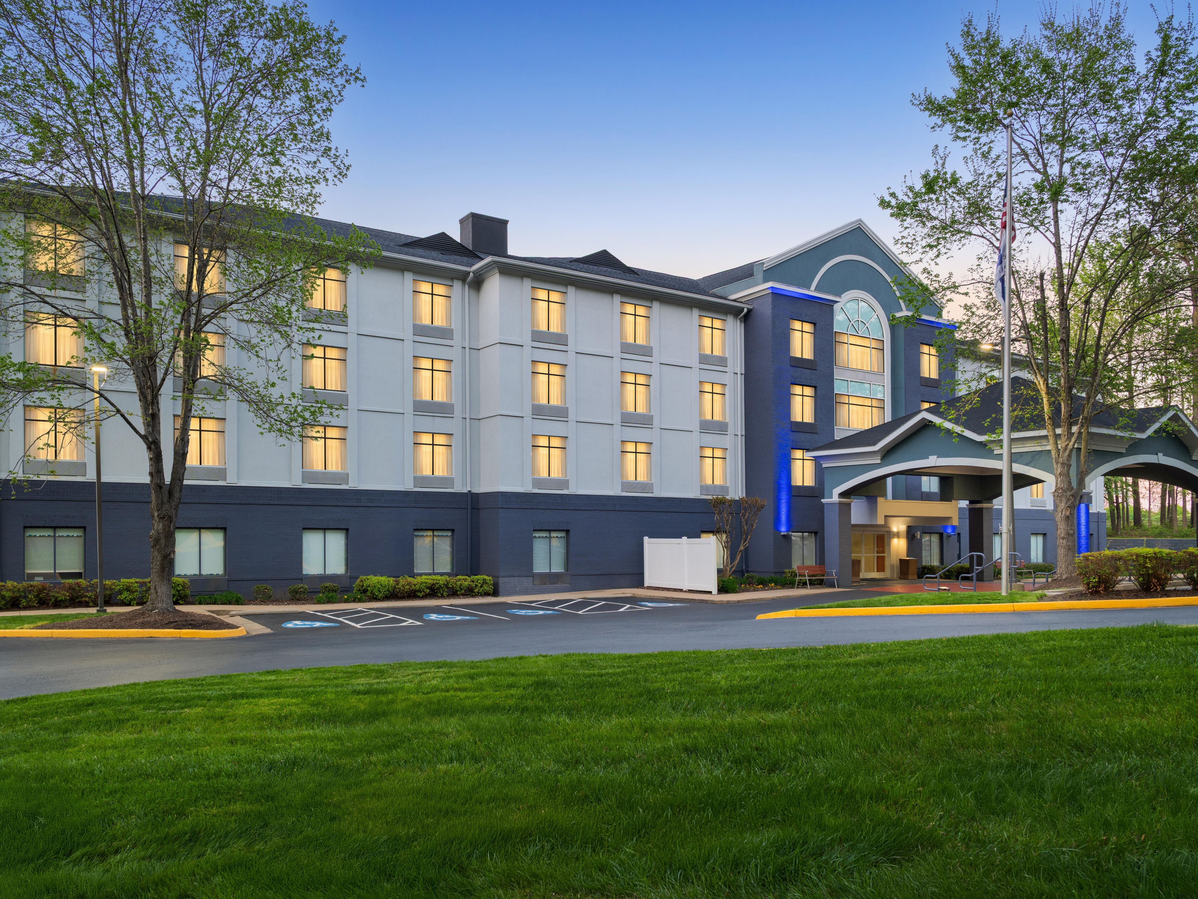 Exterior view of the hotel at dusk