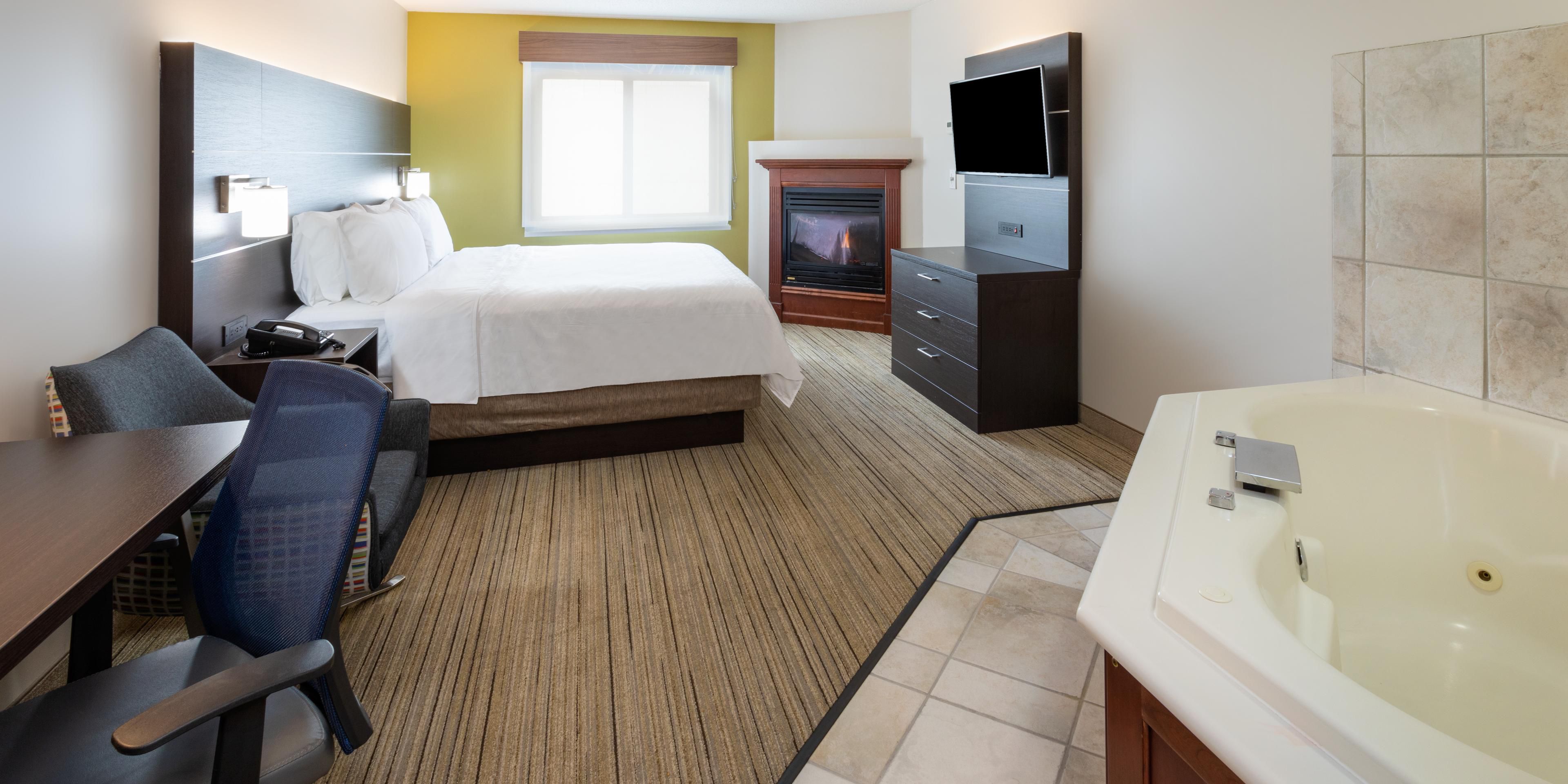 Book a romantic night away in one of our two Whirlpool Fireplace Suites. This room type features a king sized bed, gas fireplace, and a whirlpool hot tub in the room. These rooms are limited to an occupancy of two people only. Please call our front desk for pricing details and to reserve now!