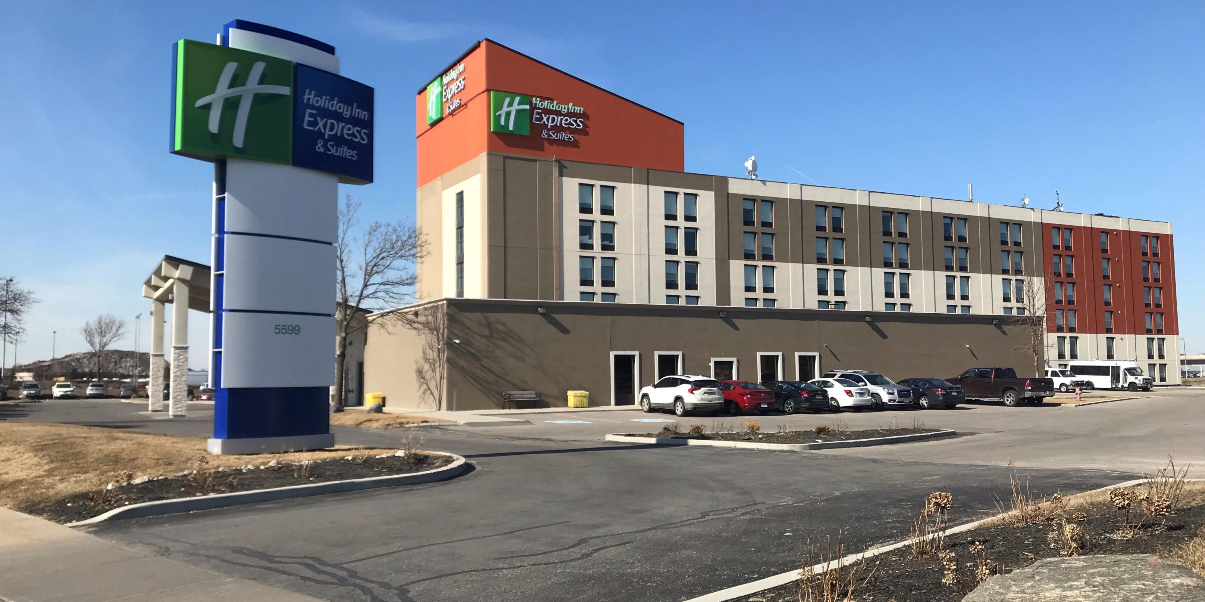 We offer 24-hour complimentary shuttle service to Toronto Pearson International Airport. Look for the blue Holiday Inn Express Toronto Airport West logo on the van. 