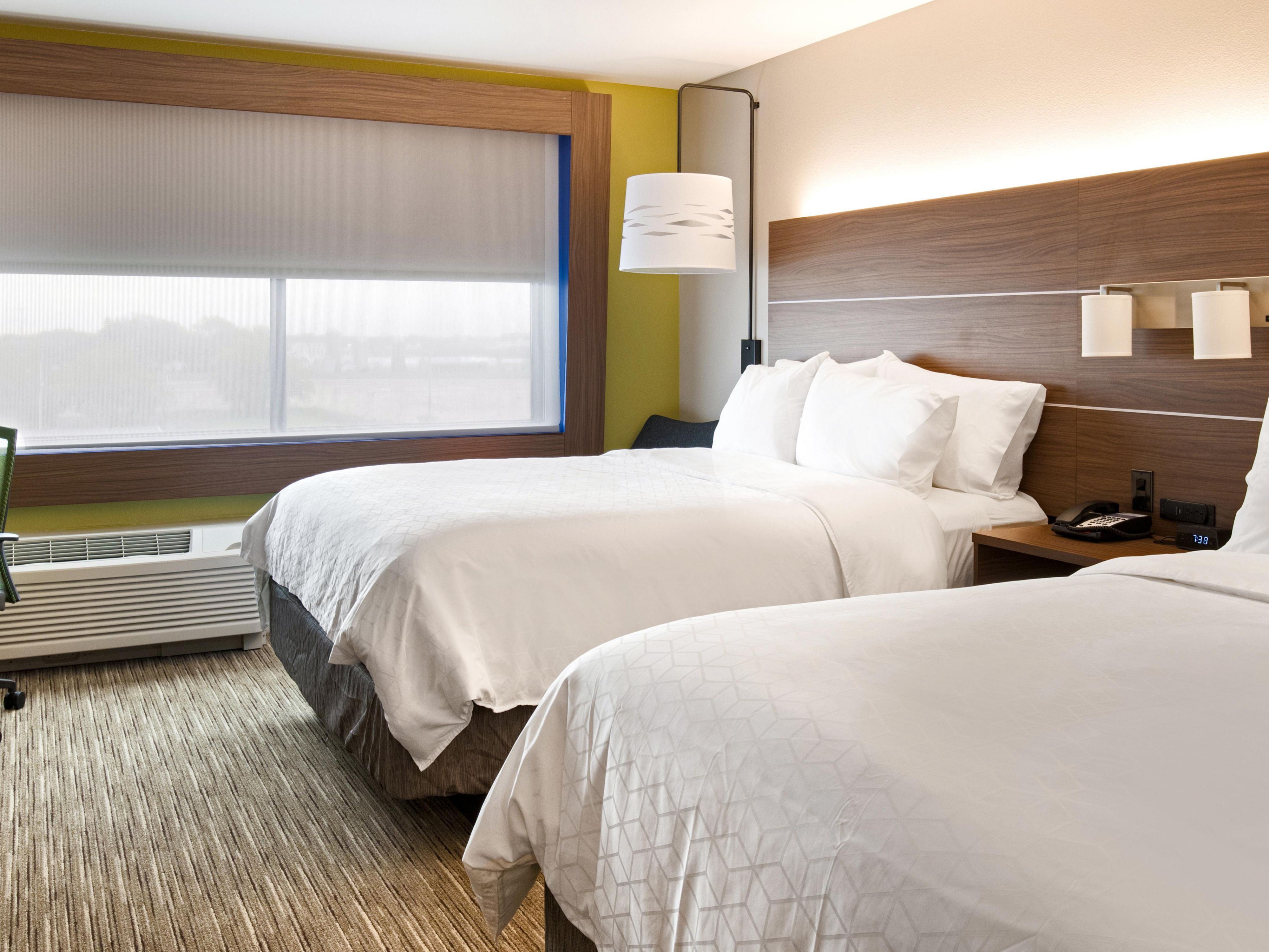 Two Queen Guest Room Features Microwave, Fridge and Work Area