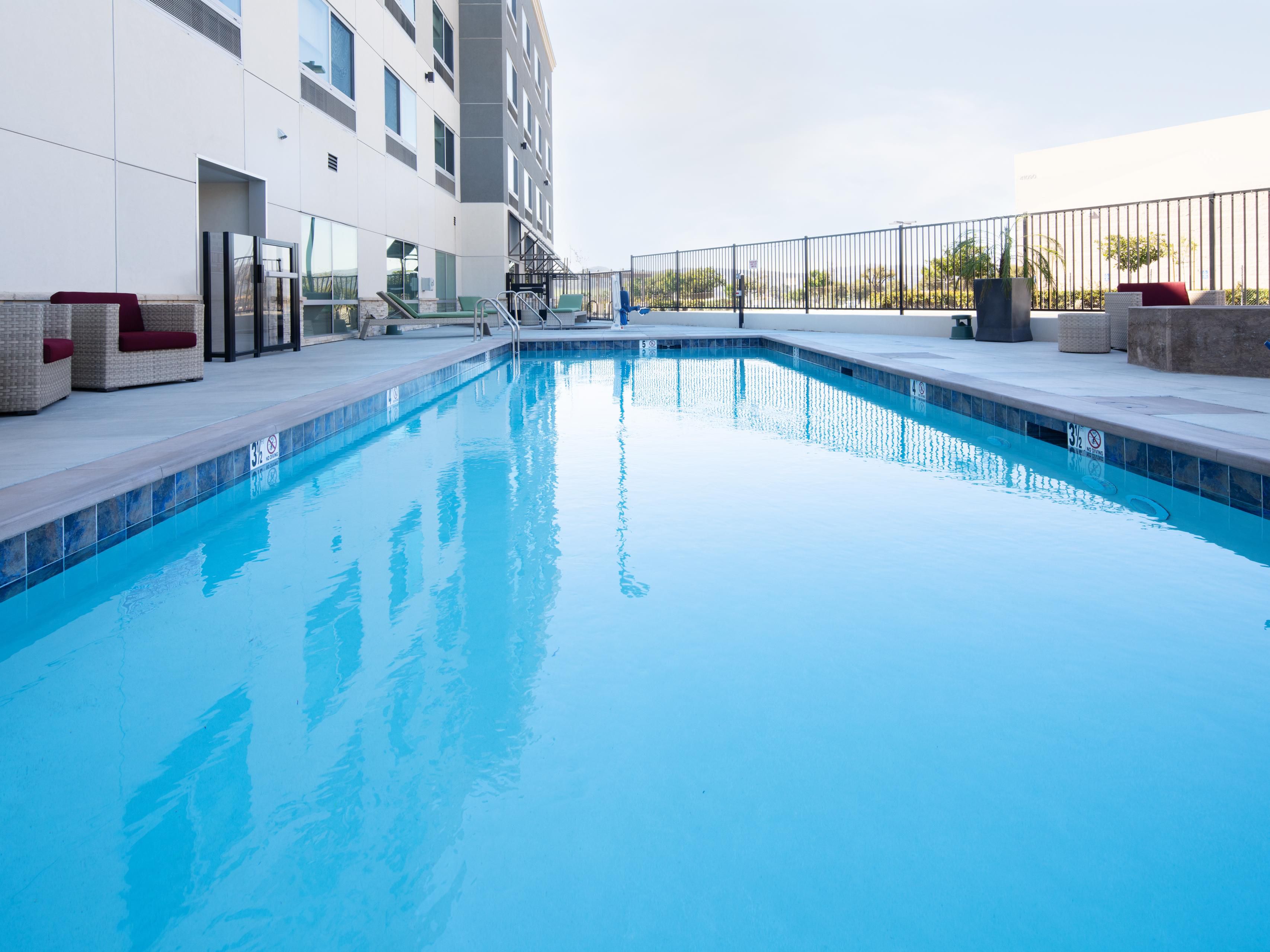 Our outdoor heated pool and spa is the perfect spot to spend time with your family.
