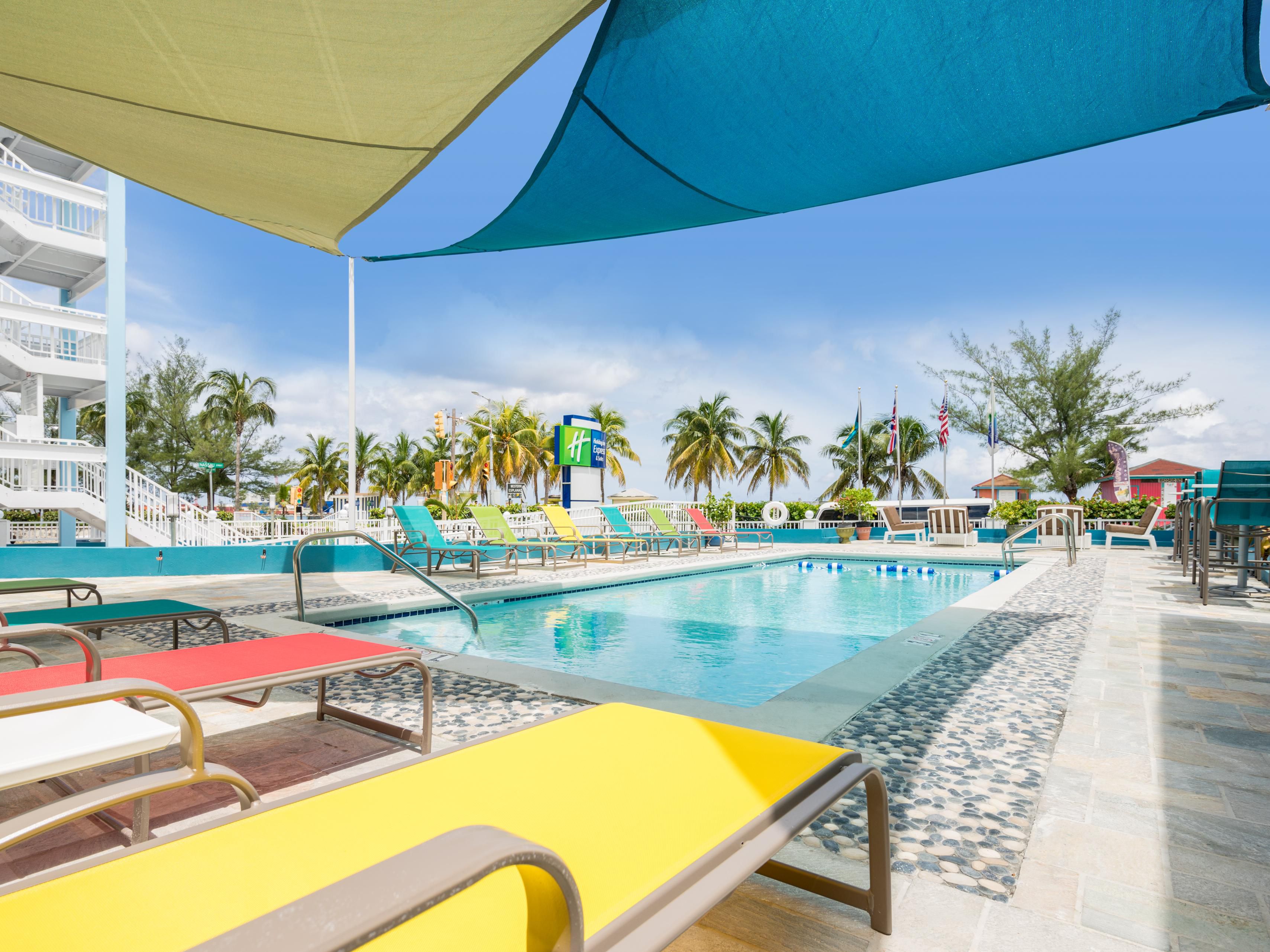 Enjoy the view of Nassau's Crystal Blue Waters on Junkanoo Beach while lounging poolside. Open daily 8am to 8pm