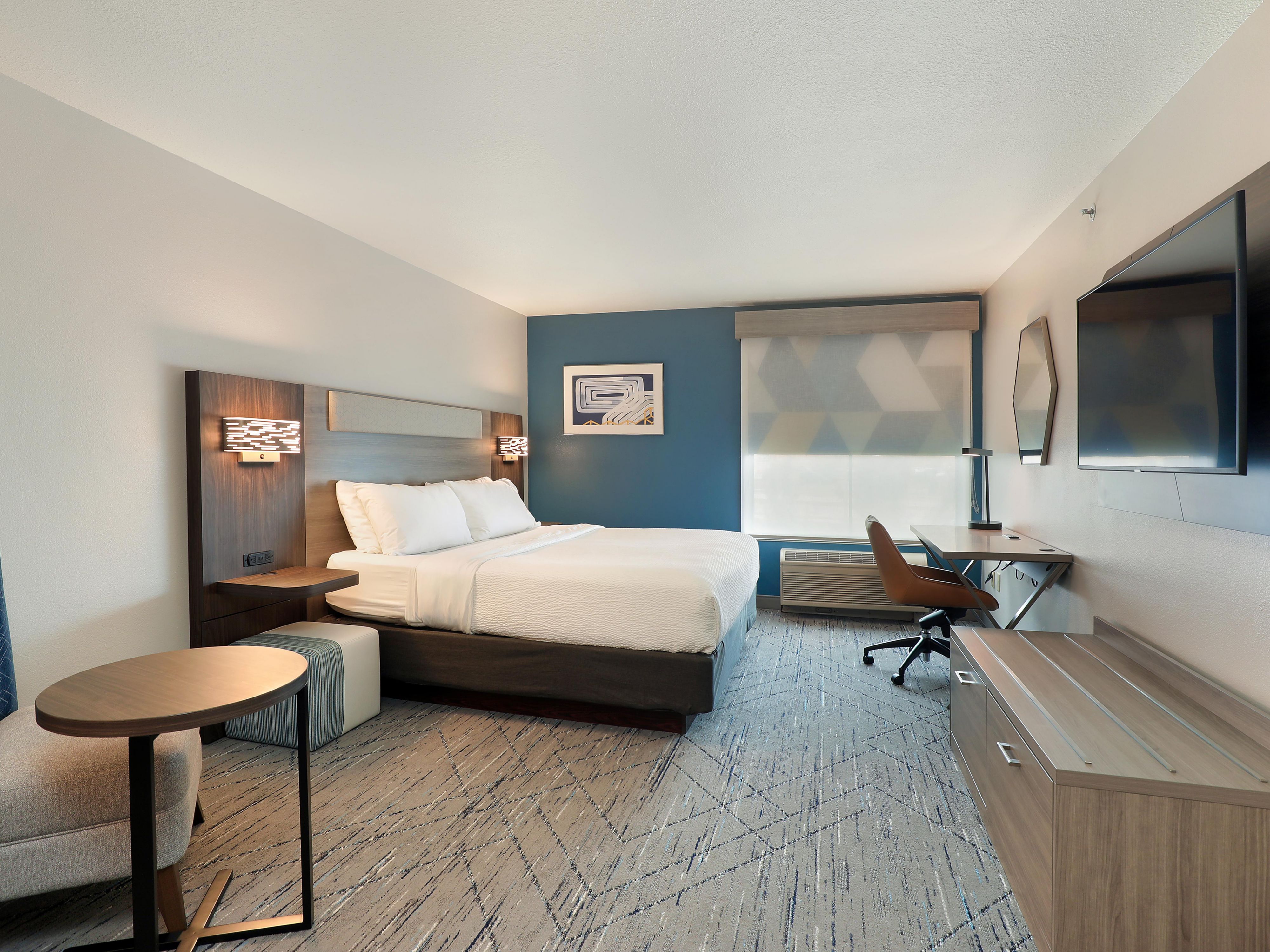 Experience comfort and style in our newly-renovated rooms at Holiday Inn Express New Berlin, WI—modern design, cozy vibes, and ultimate relaxation await!