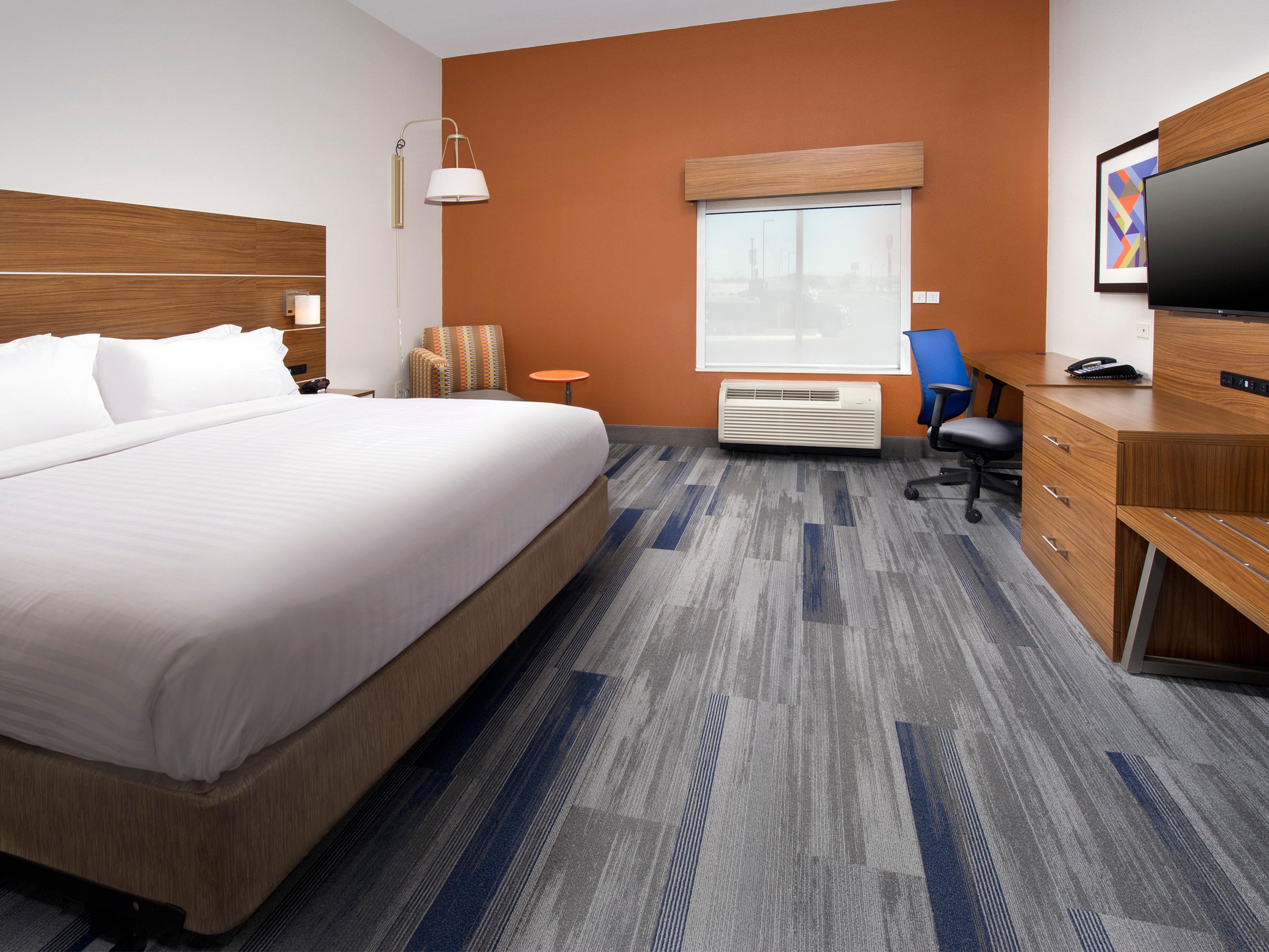 Retreat to our stylishly designed rooms and suites, each featuring premium bedding, complimentary high-speed Wi-Fi, flat-screen TV, mini-fridge, microwave, Keurig coffee maker, and plush bath amenities. Choose from king or two queen beds or opt for a spacious suite, ideal for families and extended stays.