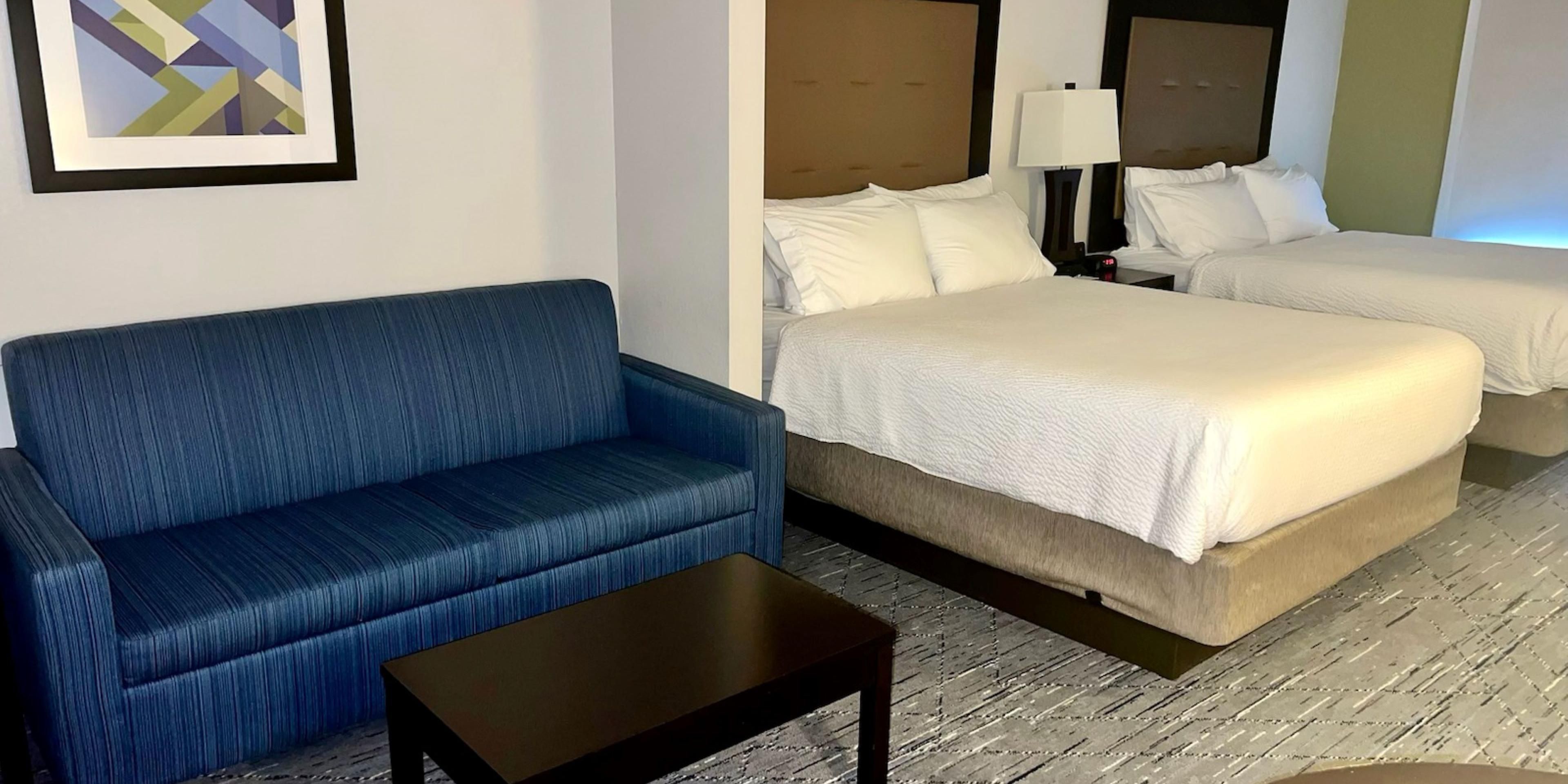 Our newly updated suites are the perfect choice for your stay in New Martinsville WV! Each suite features a mini ridge, microwave, Keurig coffee maker, pull out couch, and dinette seating area. We have upgraded suite TVs with 55" Smart TVs and brand new carpet.