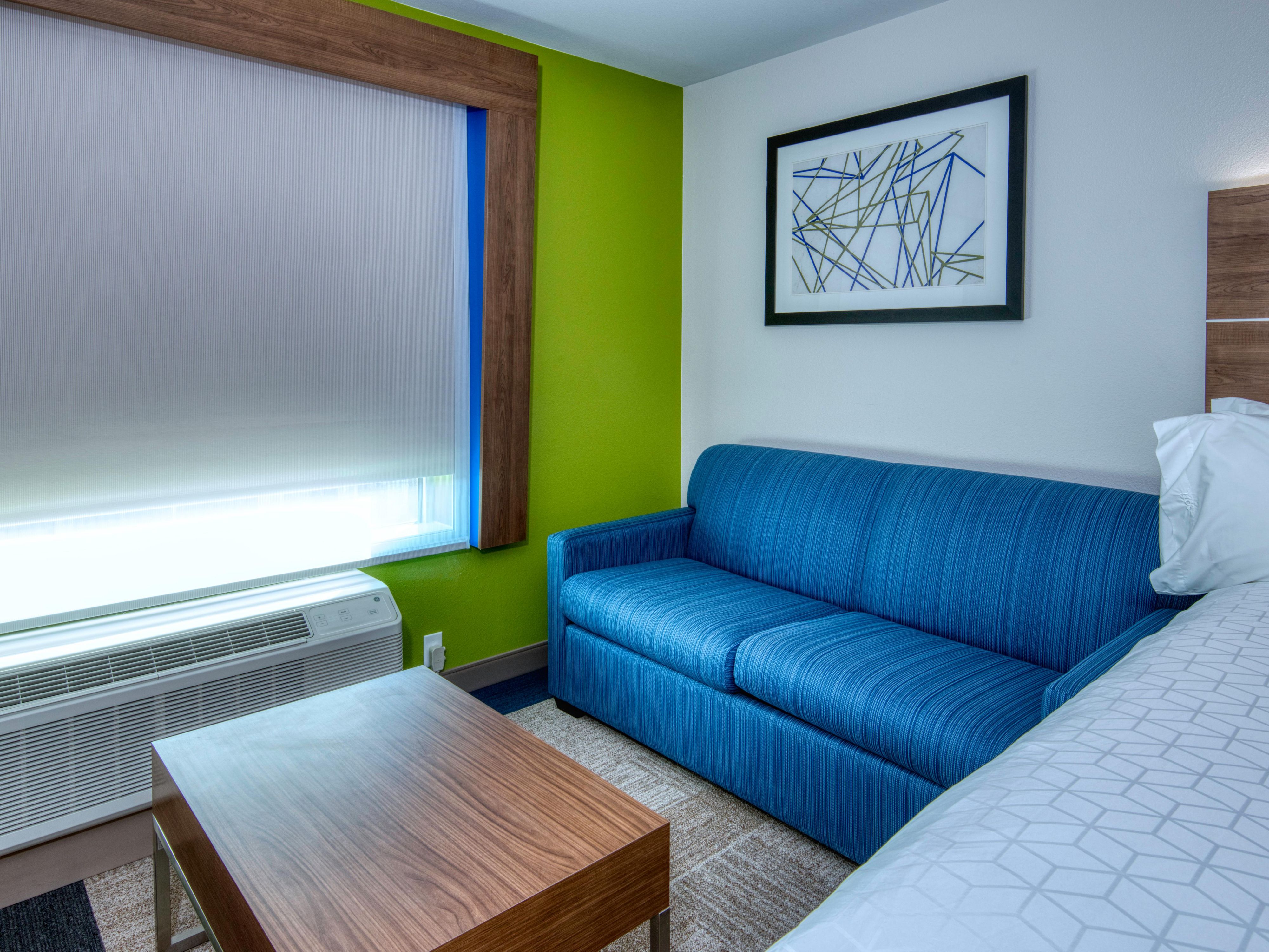 Spread out in our Two Queen Suite with Living Area