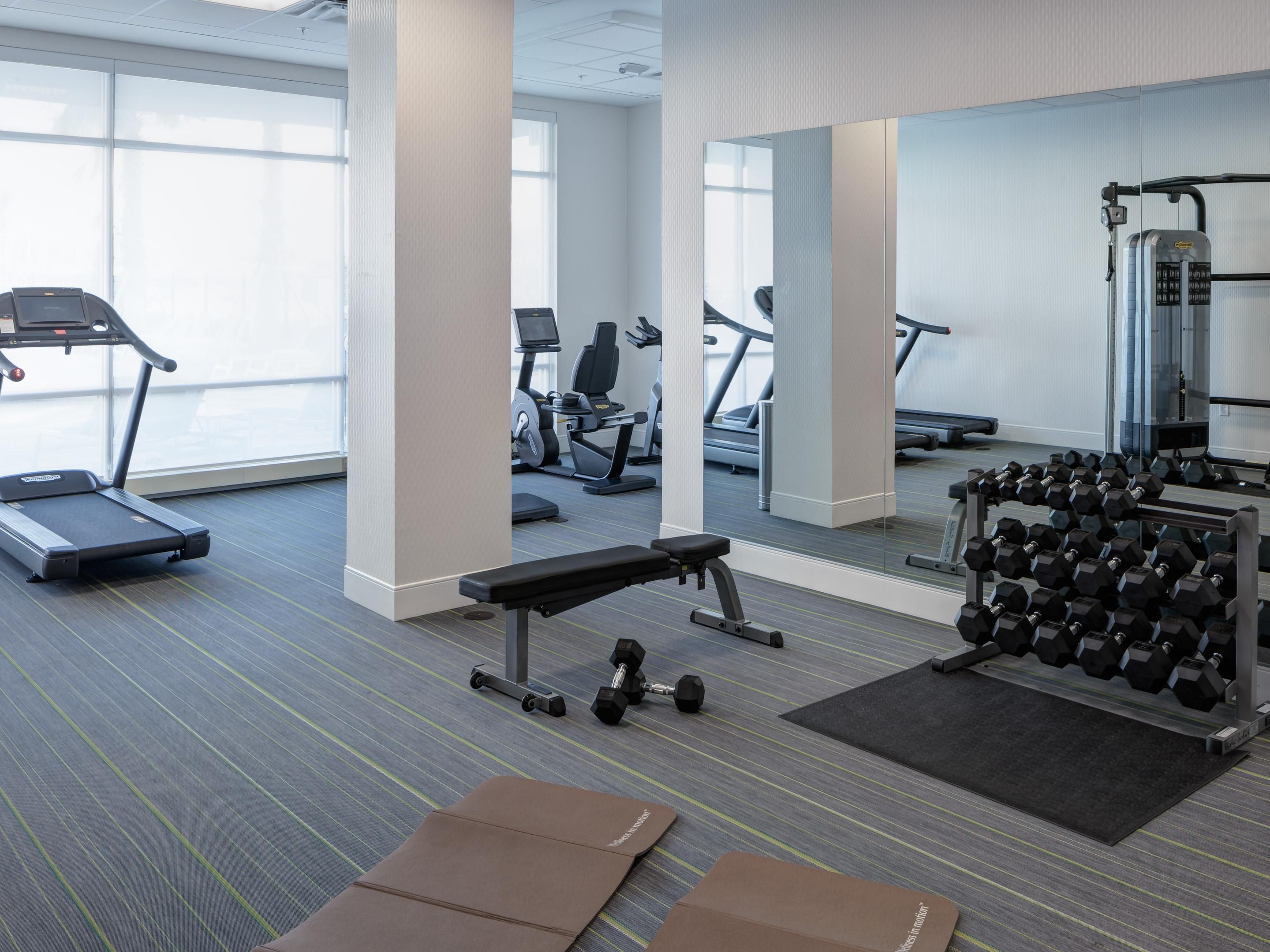 Stay active anytime in our 24-hour fitness center featuring Technogym® equipment, free weights, and cardio machines.