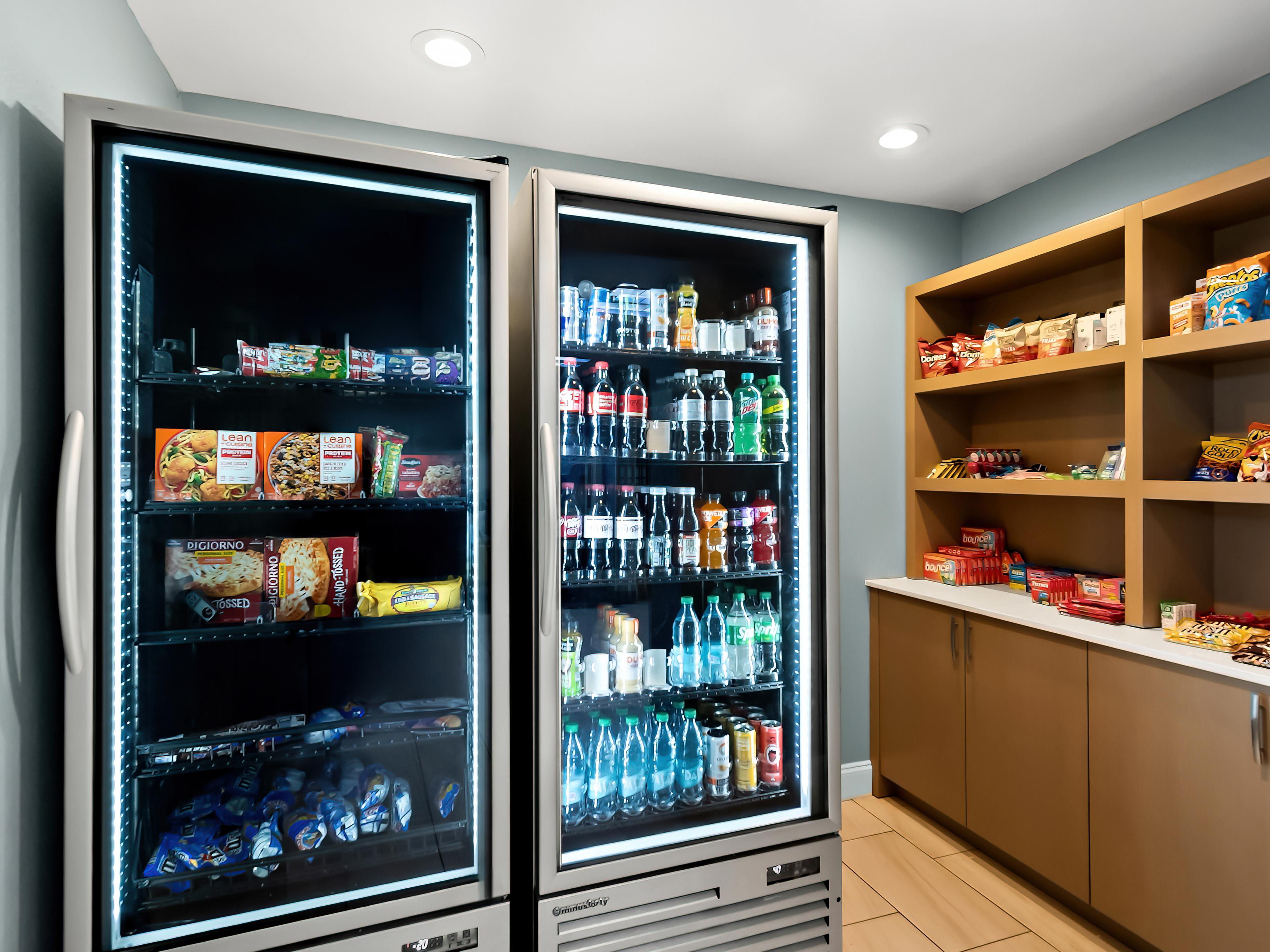 A convenient refreshment station in a hotel with drinks and food.