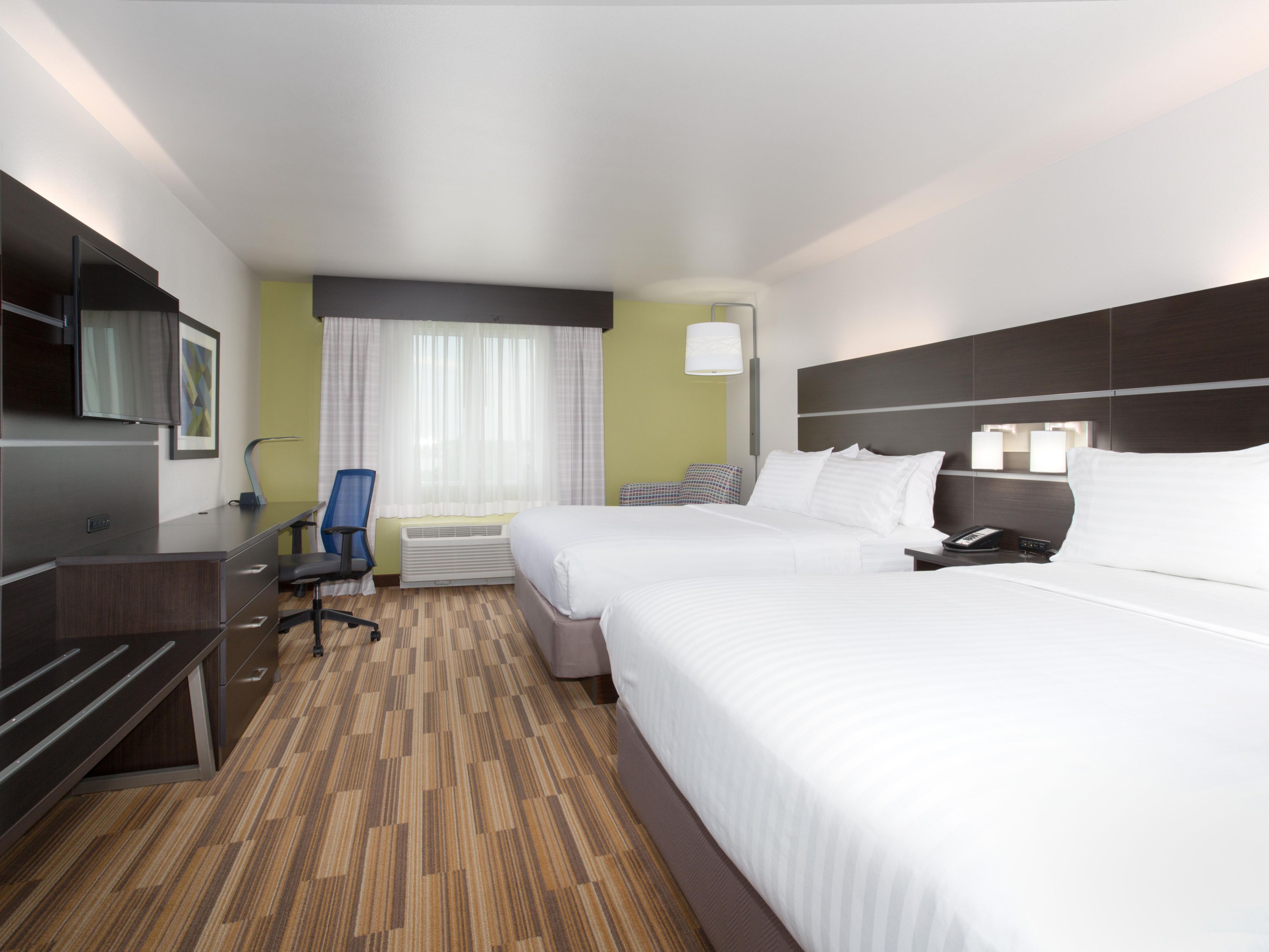 Choose one king or two queen beds with premium bedding.