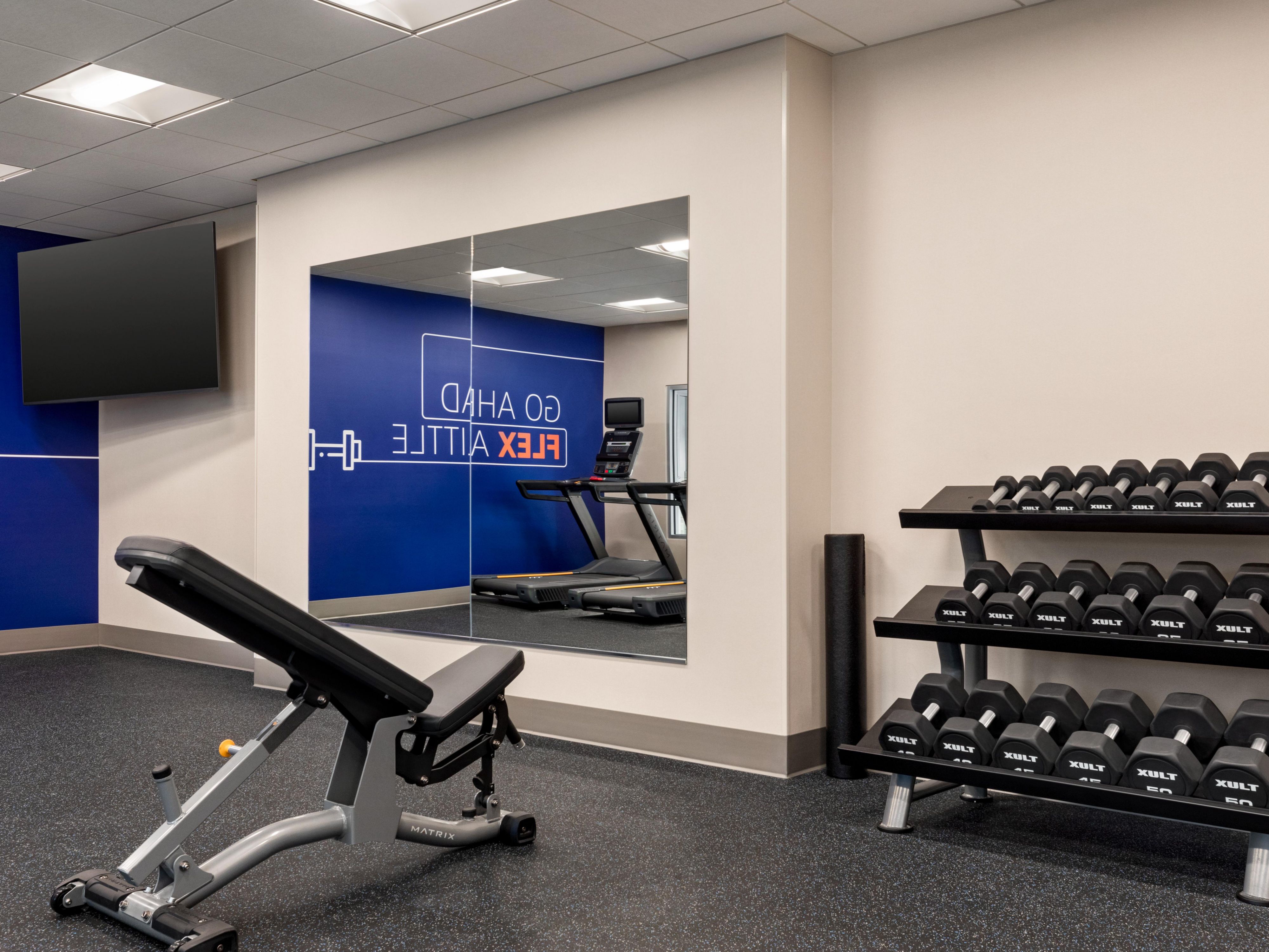 We have a 24 hour Fitness Center with a 70" TV.  2 elliptical machines, an exercise bike and 3 treadmills for you to choose from. 