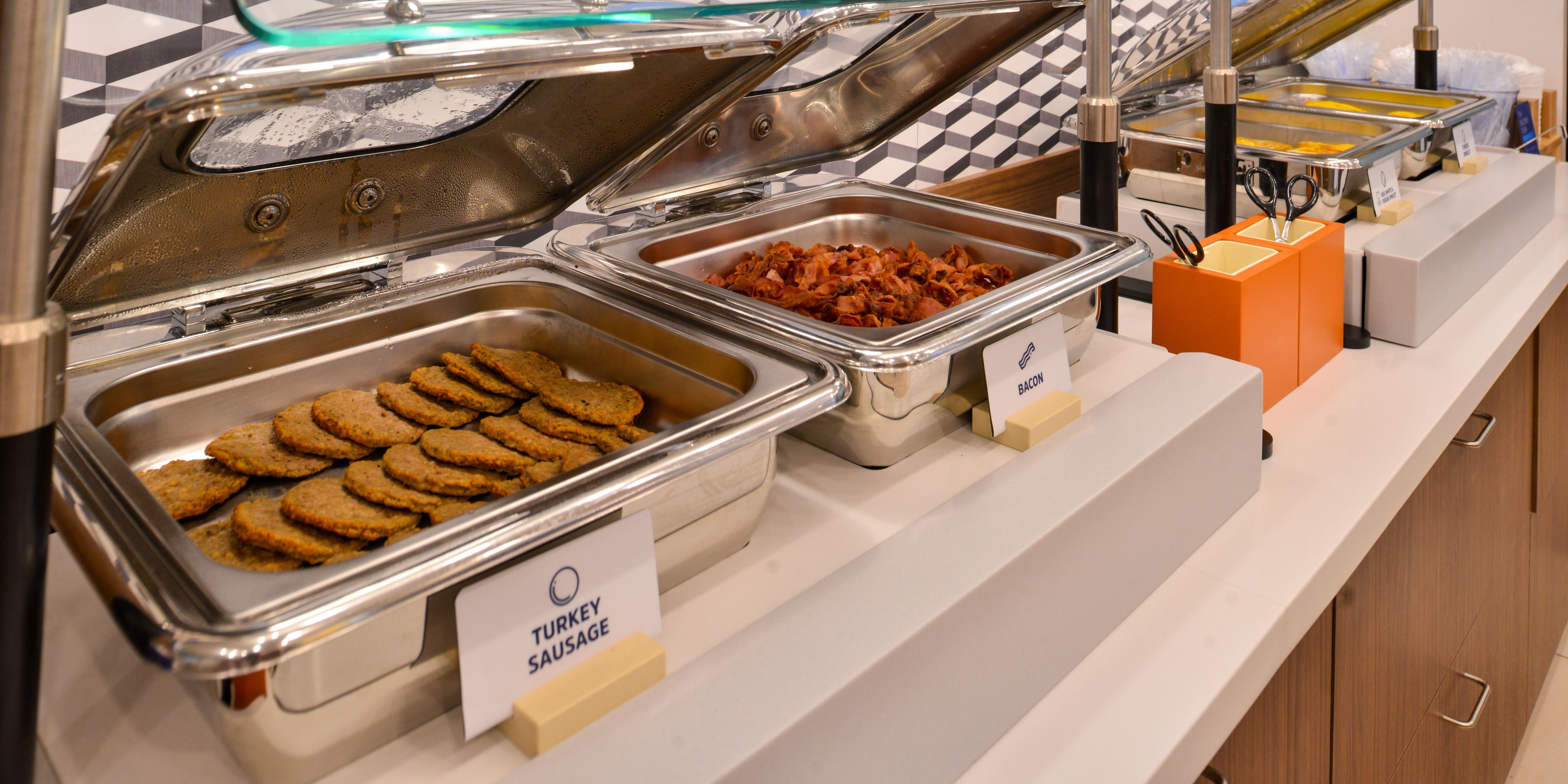 Enjoy some of our added value features including free breakfast and free parking. Start your day off right at our hot breakfast buffet and enjoy fresh fruit, our exclusive cinnamon buns, eggs, breakfast meats, yogurts, cereals, breads, muffins, bagels, coffee, juices, fresh pancakes, and also enjoy the convenience of ample onsite parking.