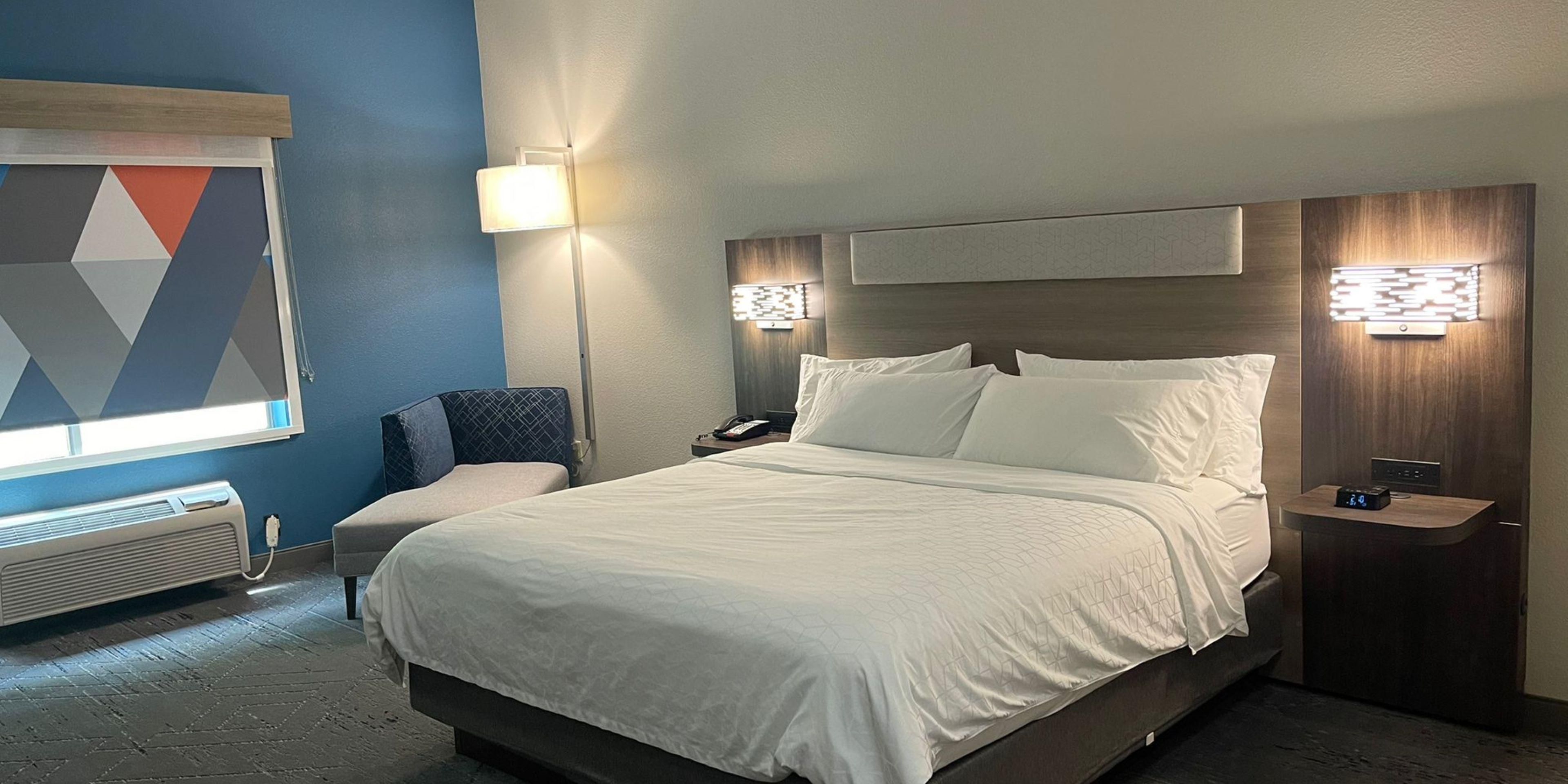 You will love our new look! Our modern, comfortable and quiet guest rooms feature new carpeting, blackout blinds, all new bathrooms including powerful showers with upgraded marble & tile. We have all new mattresses and bedding to relax in while enjoying  watching the flat screen TV while checking your social media on the free wi fi that we offer. 